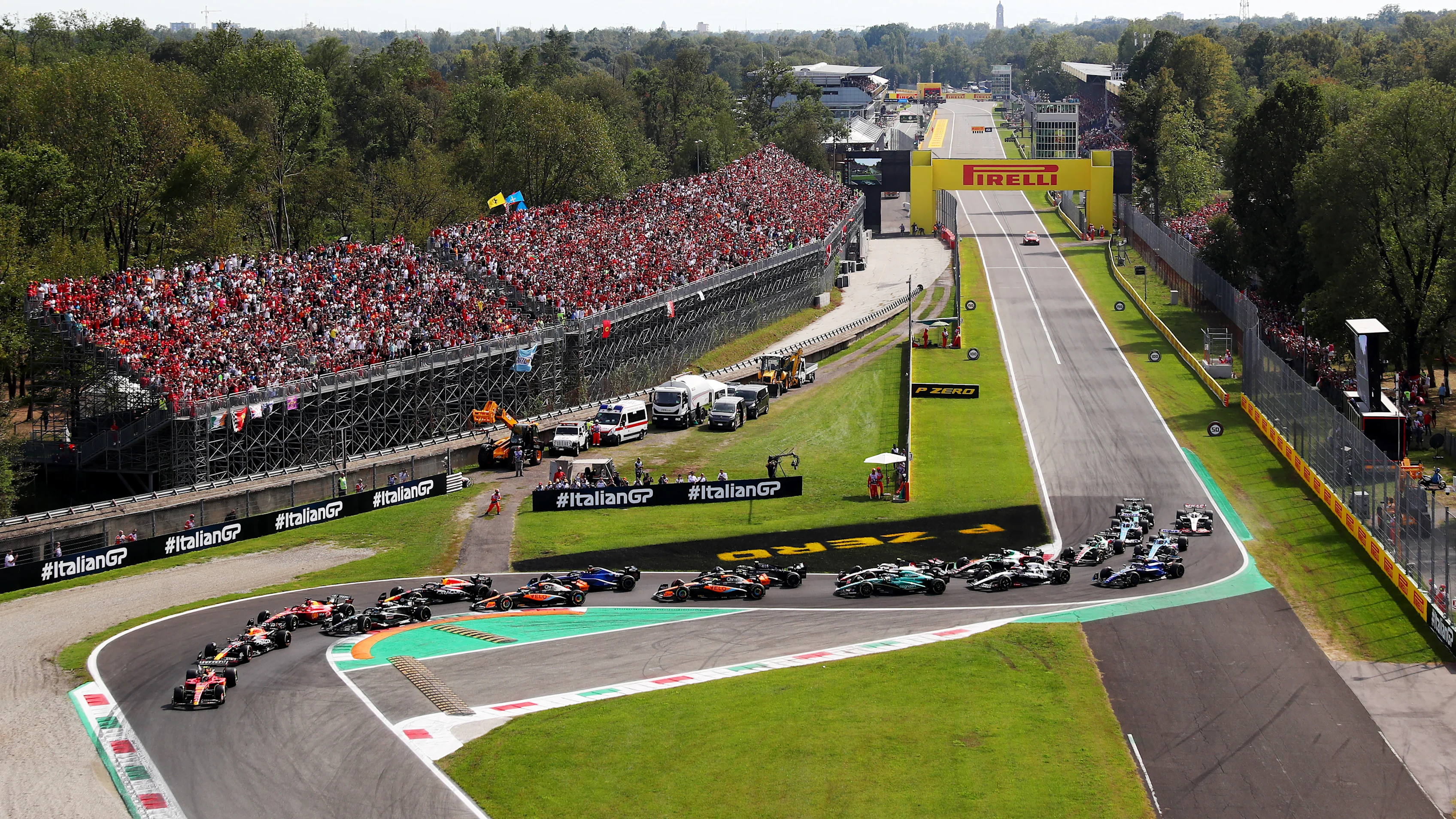 MONZA, ITALY - SEPTEMBER 03: Carlos Sainz of Spain driving (55) the Ferrari SF-23 leads Max