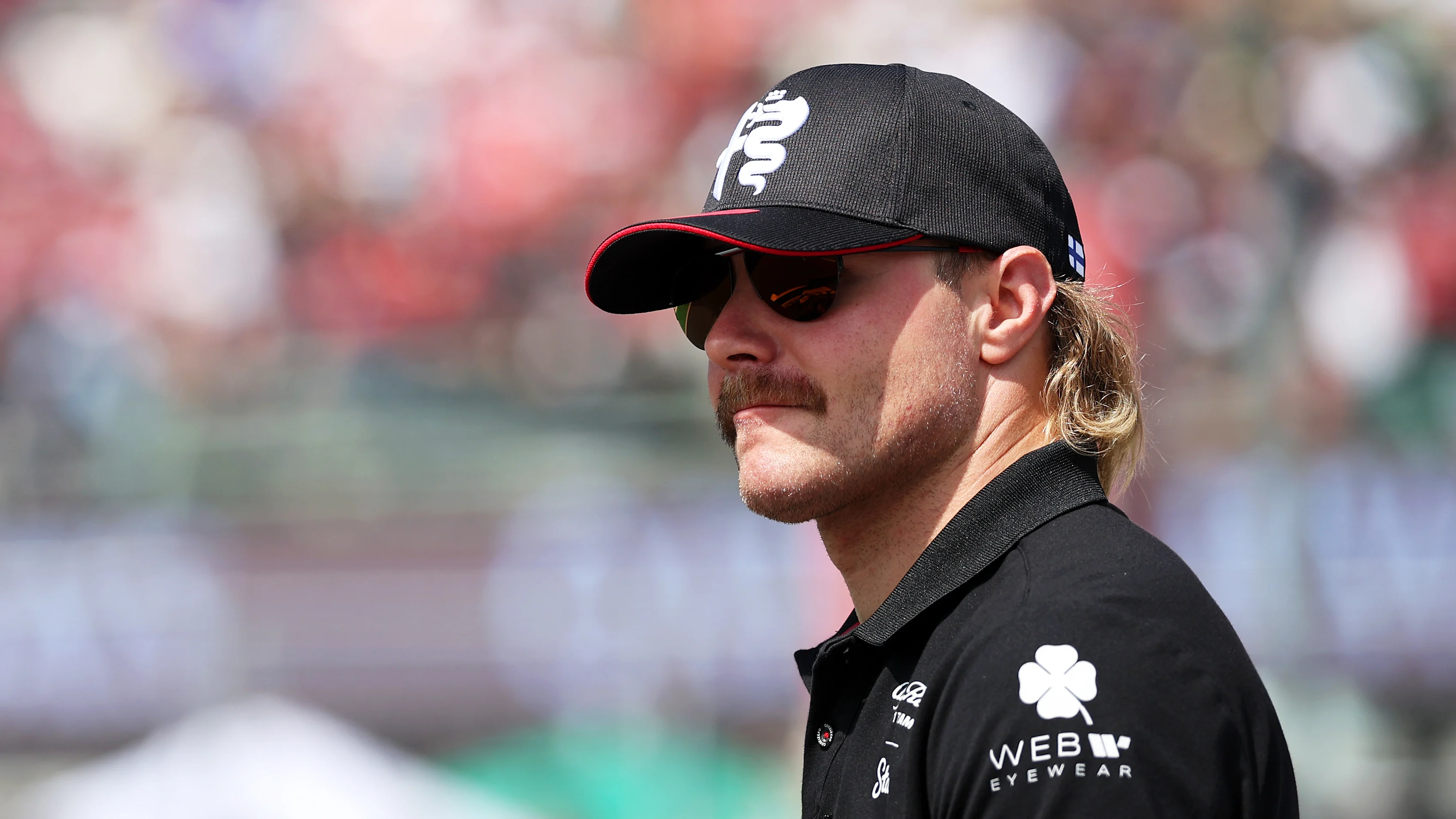 MEXICO CITY, MEXICO - OCTOBER 29: Valtteri Bottas of Finland and Alfa Romeo F1 looks on from the
