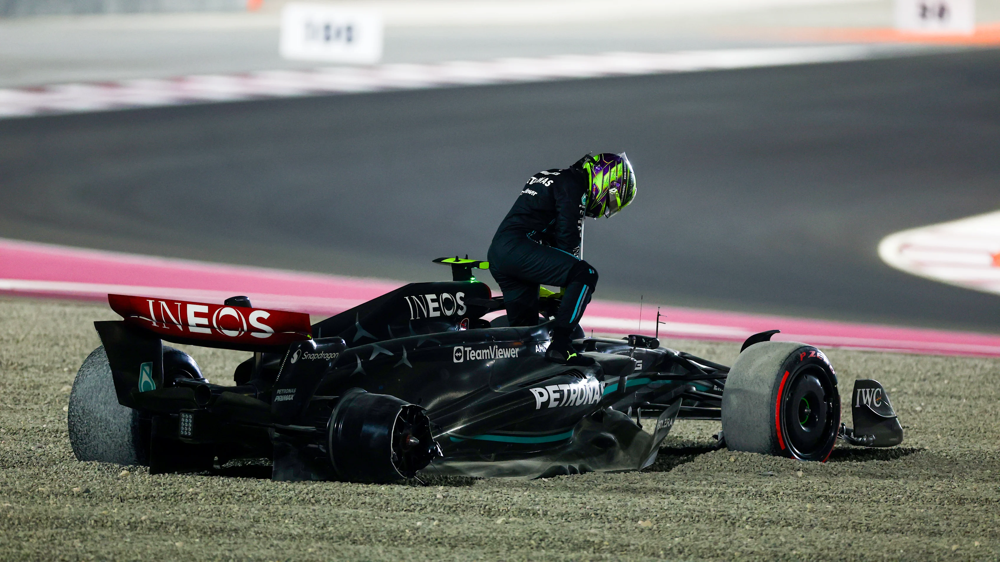 LUSAIL CITY, QATAR - OCTOBER 08: Lewis Hamilton of Great Britain and Mercedes looks on after