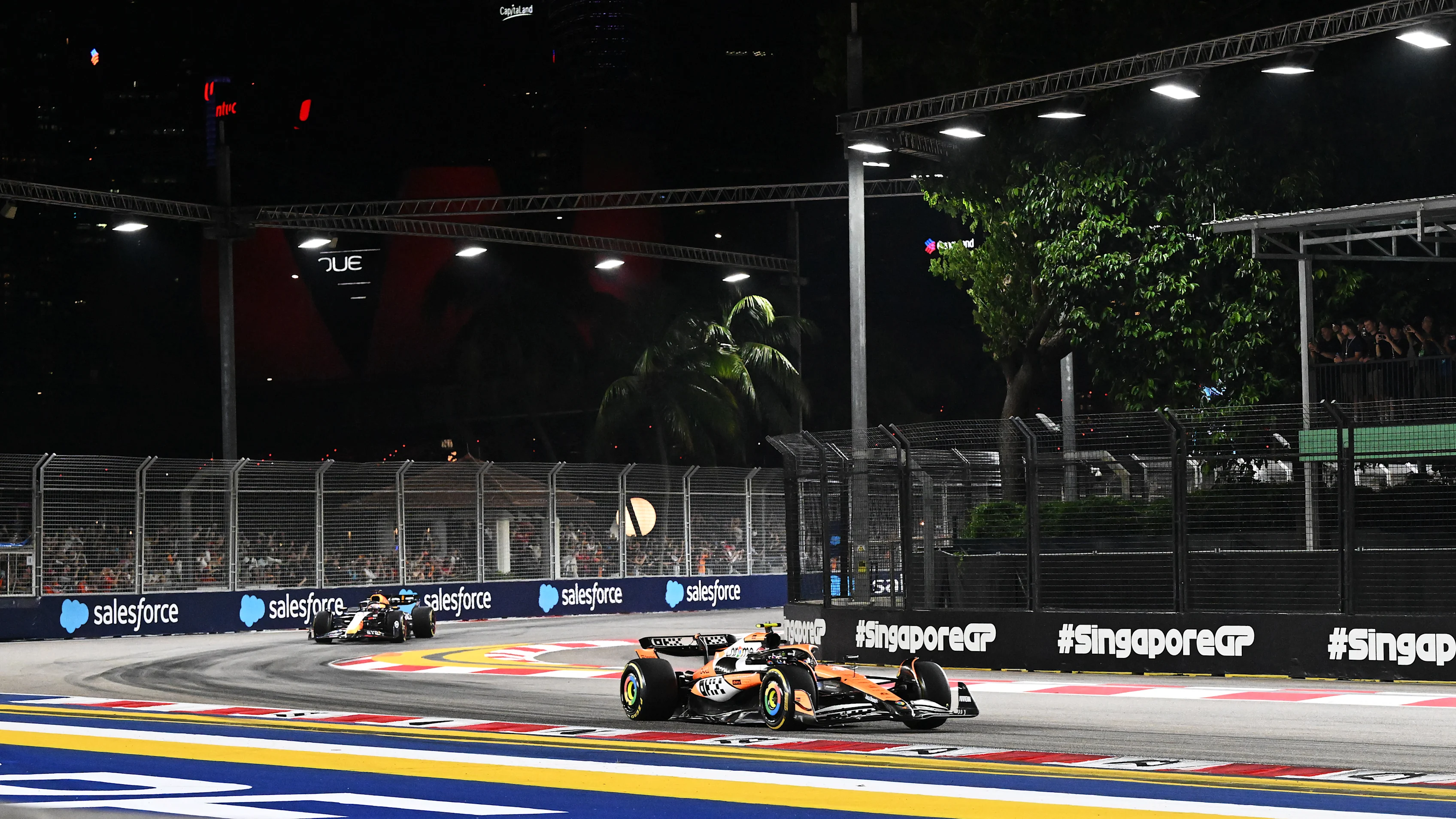 SINGAPORE, SINGAPORE - SEPTEMBER 22: Lando Norris of Great Britain driving the (4) McLaren MCL38