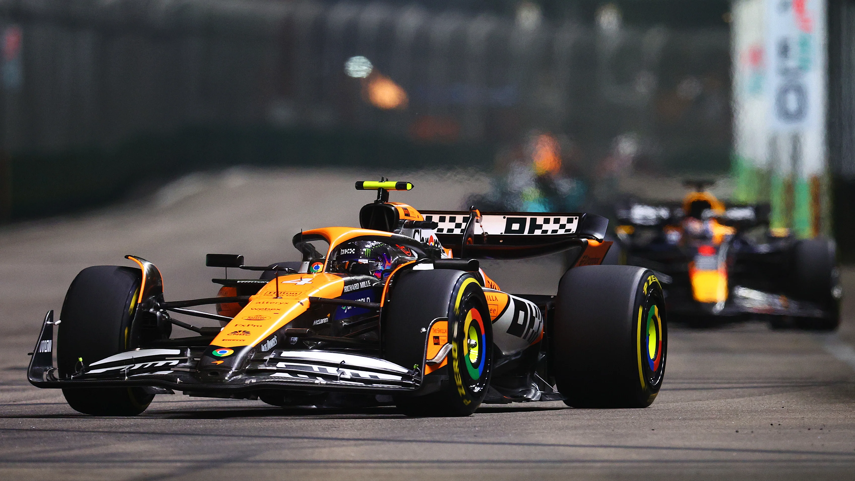 SINGAPORE, SINGAPORE - SEPTEMBER 22: Lando Norris of Great Britain driving the (4) McLaren MCL38