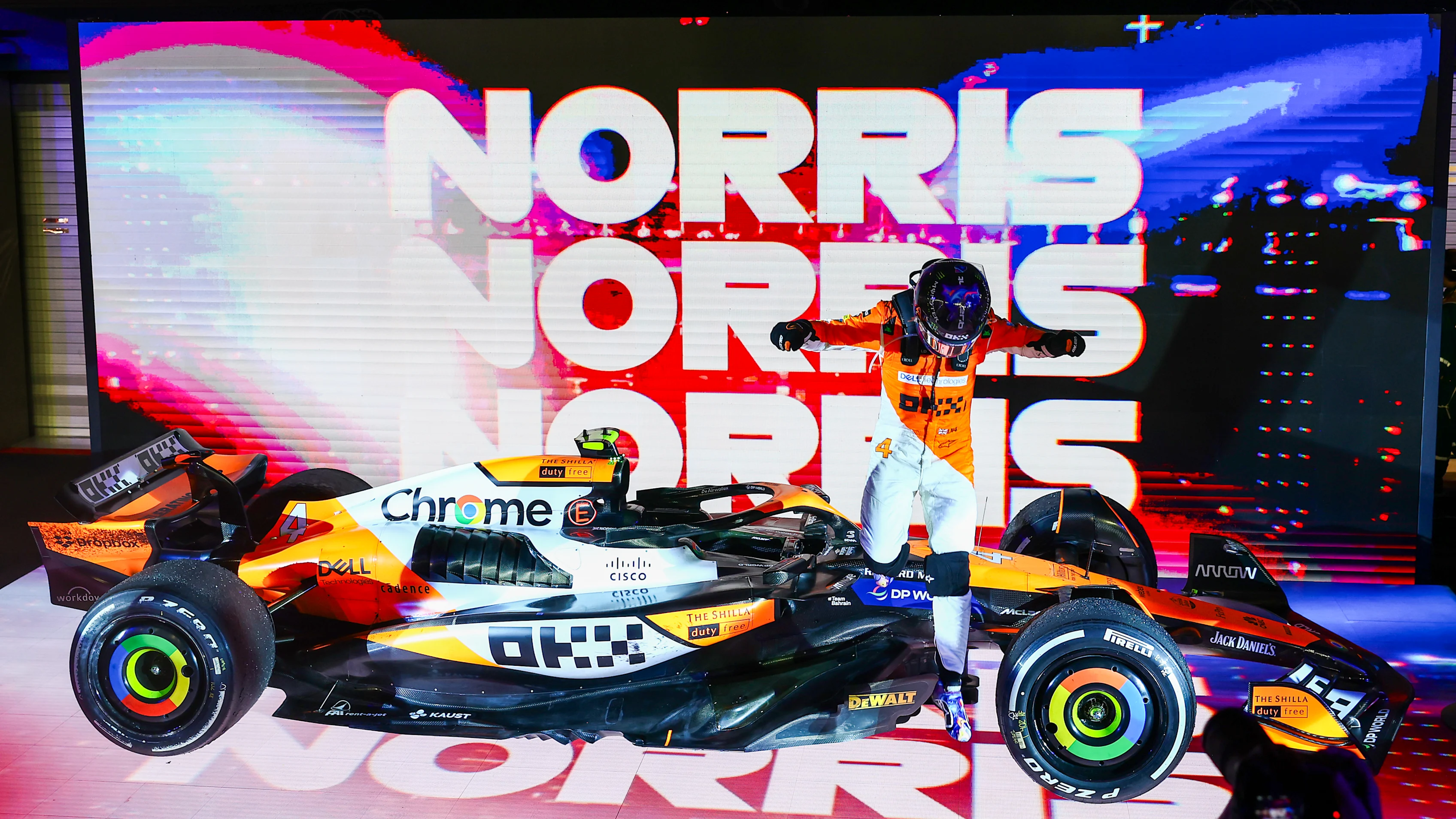 SINGAPORE, SINGAPORE - SEPTEMBER 22: Race winner Lando Norris of Great Britain and McLaren