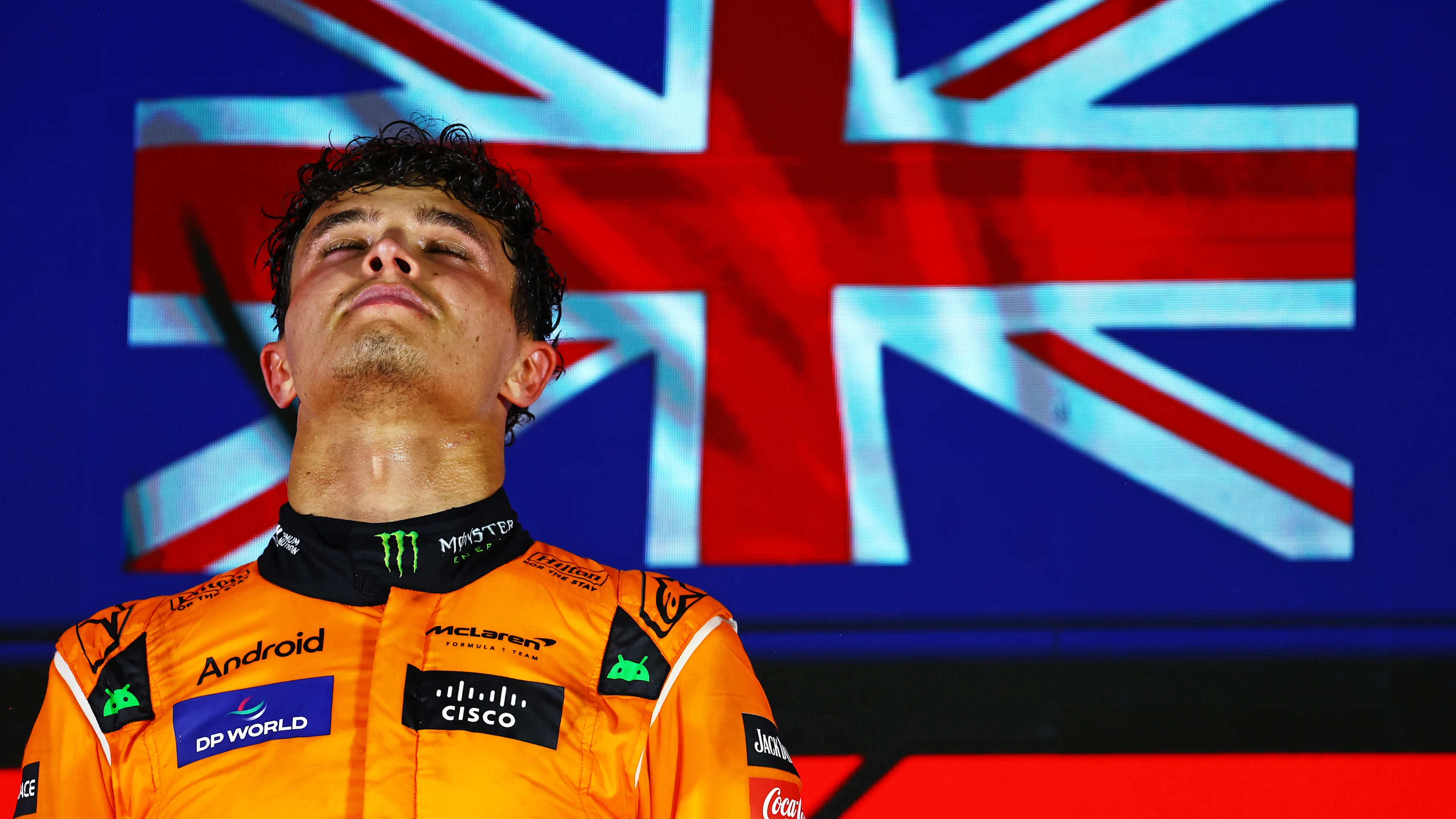 SINGAPORE, SINGAPORE - SEPTEMBER 22: Race winner Lando Norris of Great Britain and McLaren