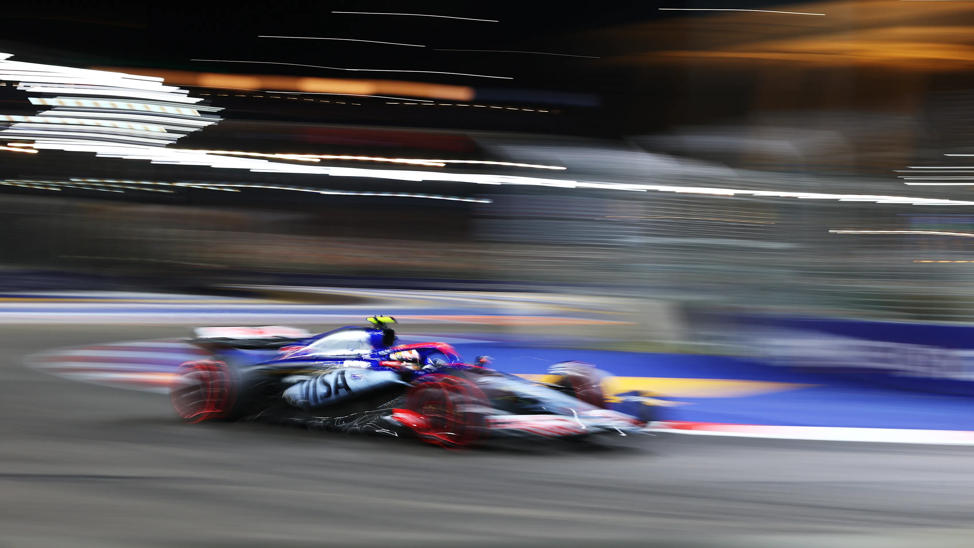 SINGAPORE, SINGAPORE - SEPTEMBER 21: Yuki Tsunoda of Japan driving the (22) Visa Cash App RB VCARB 01 on track during qualifying ahead of the F1 Grand Prix of Singapore at Marina Bay Street Circuit on September 21, 2024 in Singapore, Singapore. (Photo by Lars Baron - Formula 1/Formula 1 via Getty Images)