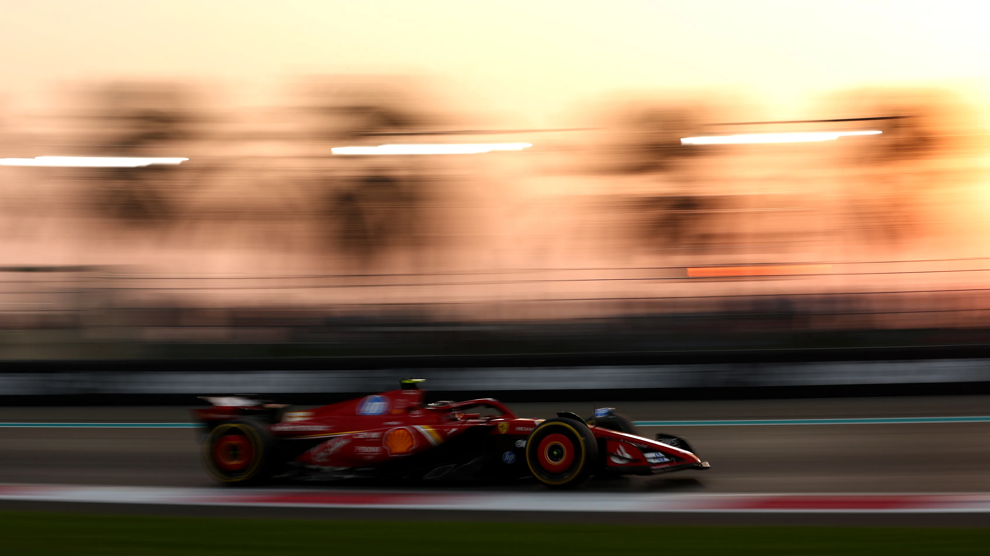 ABU DHABI, UNITED ARAB EMIRATES - DECEMBER 06: Carlos Sainz of Spain driving (55) the Ferrari SF-24 on track during practice ahead of the F1 Grand Prix of Abu Dhabi at Yas Marina Circuit on December 06, 2024 in Abu Dhabi, United Arab Emirates. (Photo by Bryn Lennon - Formula 1/Formula 1 via Getty Images)