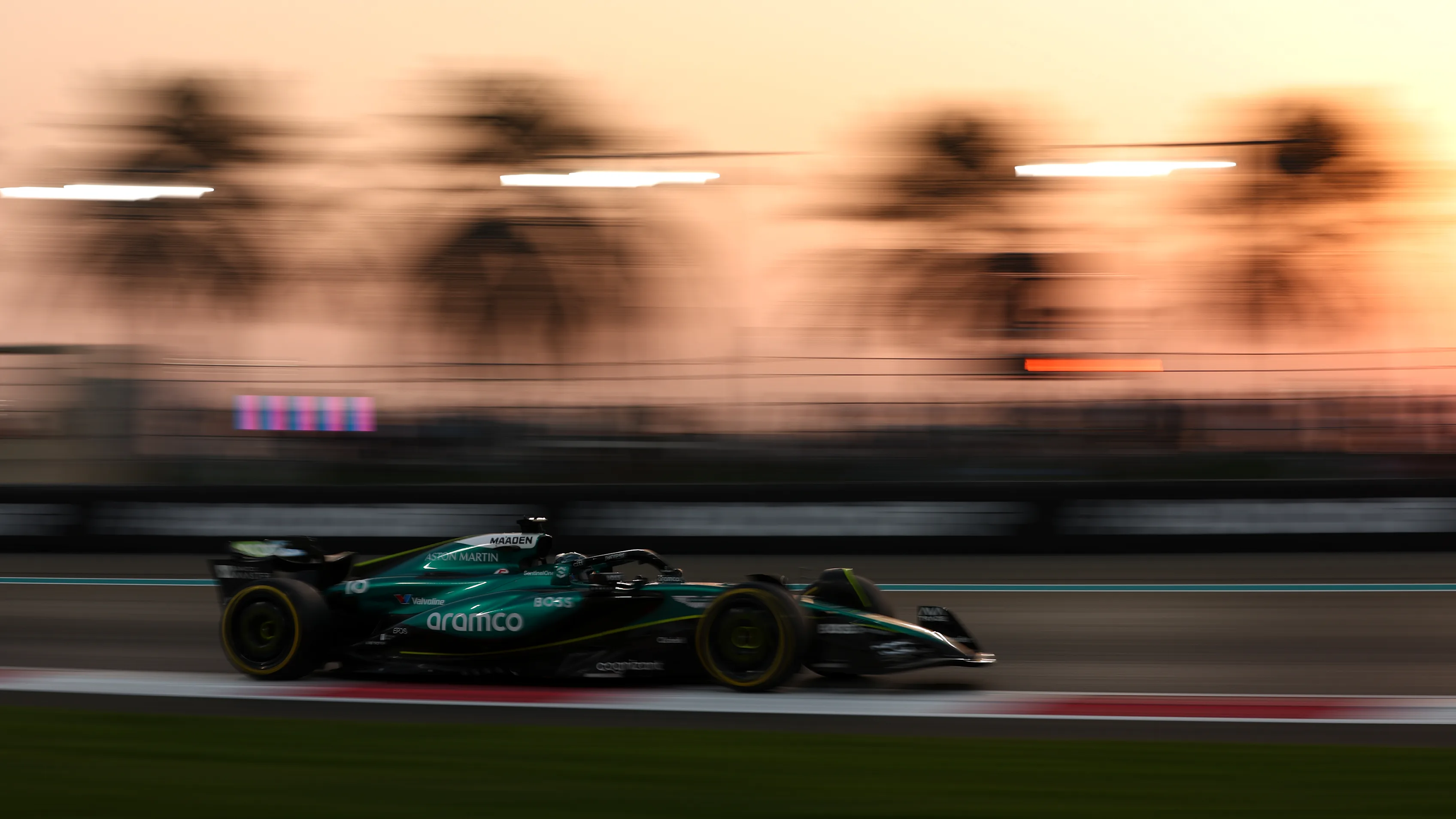 ABU DHABI, UNITED ARAB EMIRATES - DECEMBER 06: Lance Stroll of Canada driving the (18) Aston Martin AMR24 Mercedes on track during practice ahead of the F1 Grand Prix of Abu Dhabi at Yas Marina Circuit on December 06, 2024 in Abu Dhabi, United Arab Emirates. (Photo by Bryn Lennon - Formula 1/Formula 1 via Getty Images)