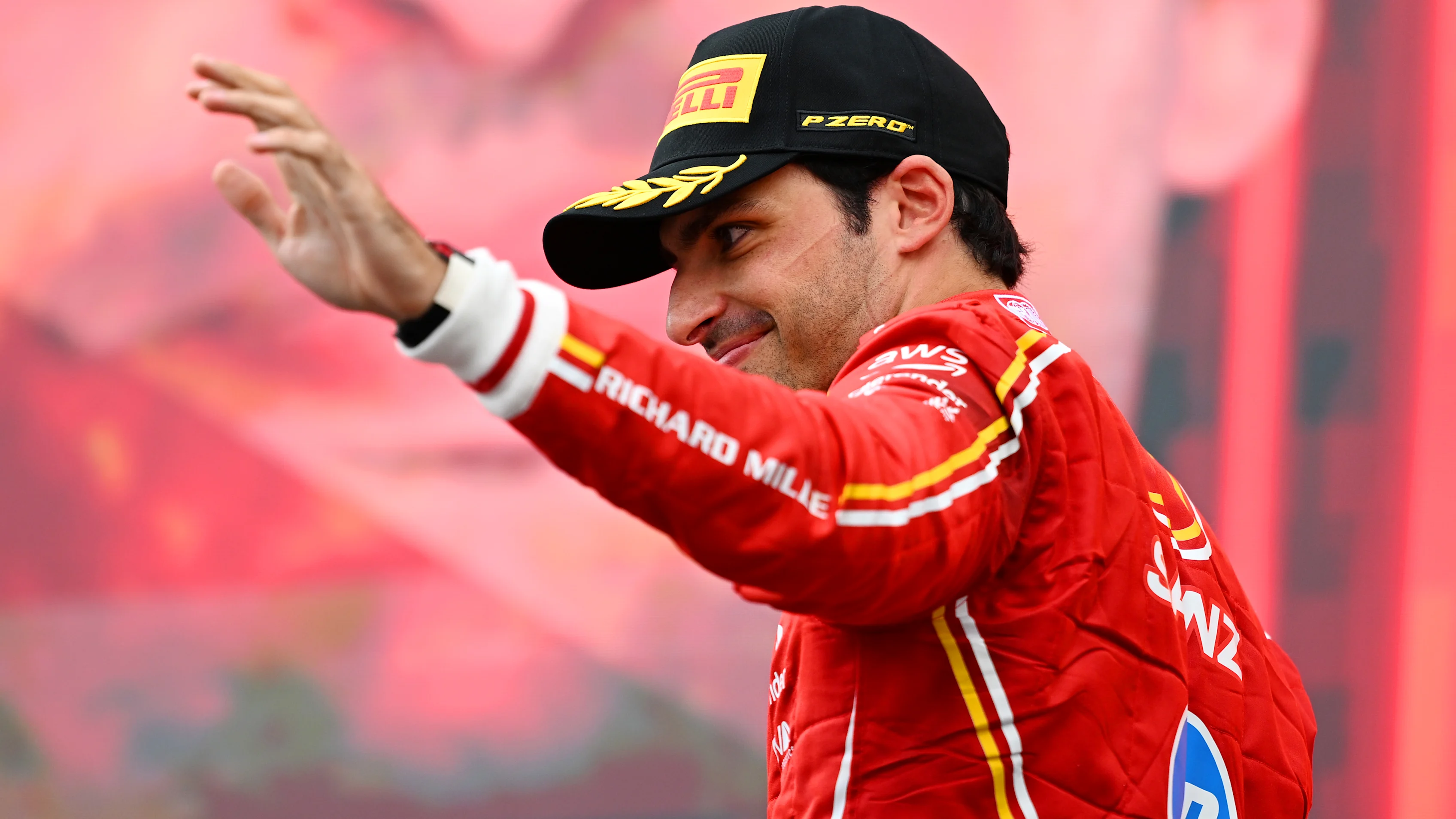 SPIELBERG, AUSTRIA - JUNE 30: Third placed Carlos Sainz of Spain and Ferrari celebrates on the