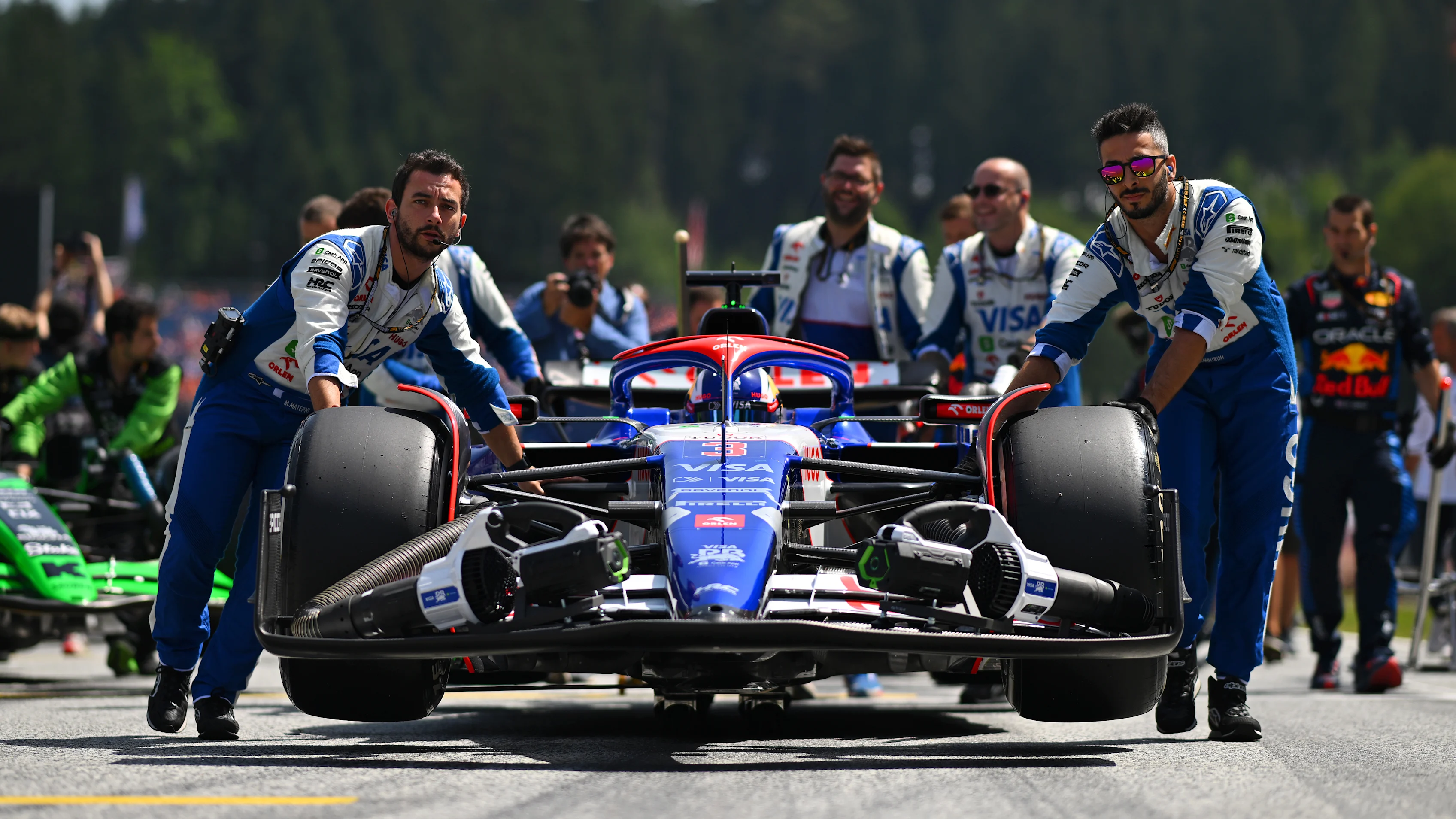 SPIELBERG, AUSTRIA - JUNE 29: Daniel Ricciardo of Australia and Visa Cash App RB prepares to drive on the grid prior to the Sprint ahead of the F1 Grand Prix of Austria at Red Bull Ring on June 29, 2024 in Spielberg, Austria. (Photo by Rudy Carezzevoli/Getty Images)