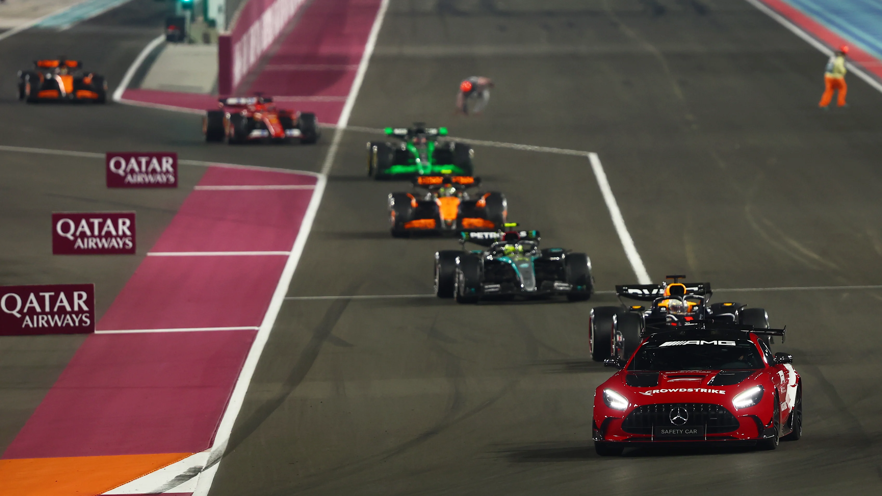 LUSAIL CITY, QATAR - DECEMBER 01: The FIA Safety Car leads the field on track during the F1 Grand