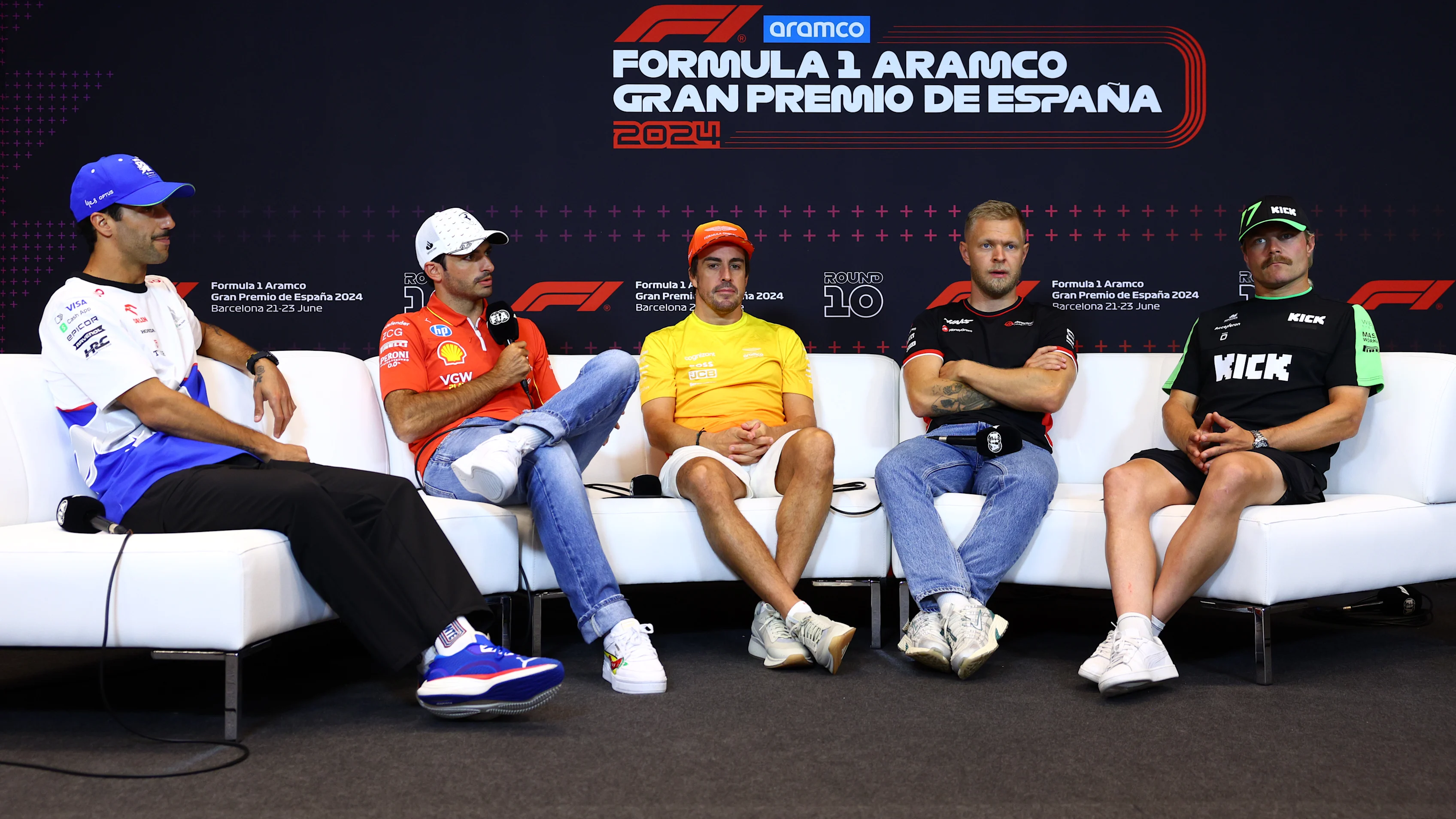 BARCELONA, SPAIN - JUNE 20: Daniel Ricciardo of Australia and Visa Cash App RB, Carlos Sainz of