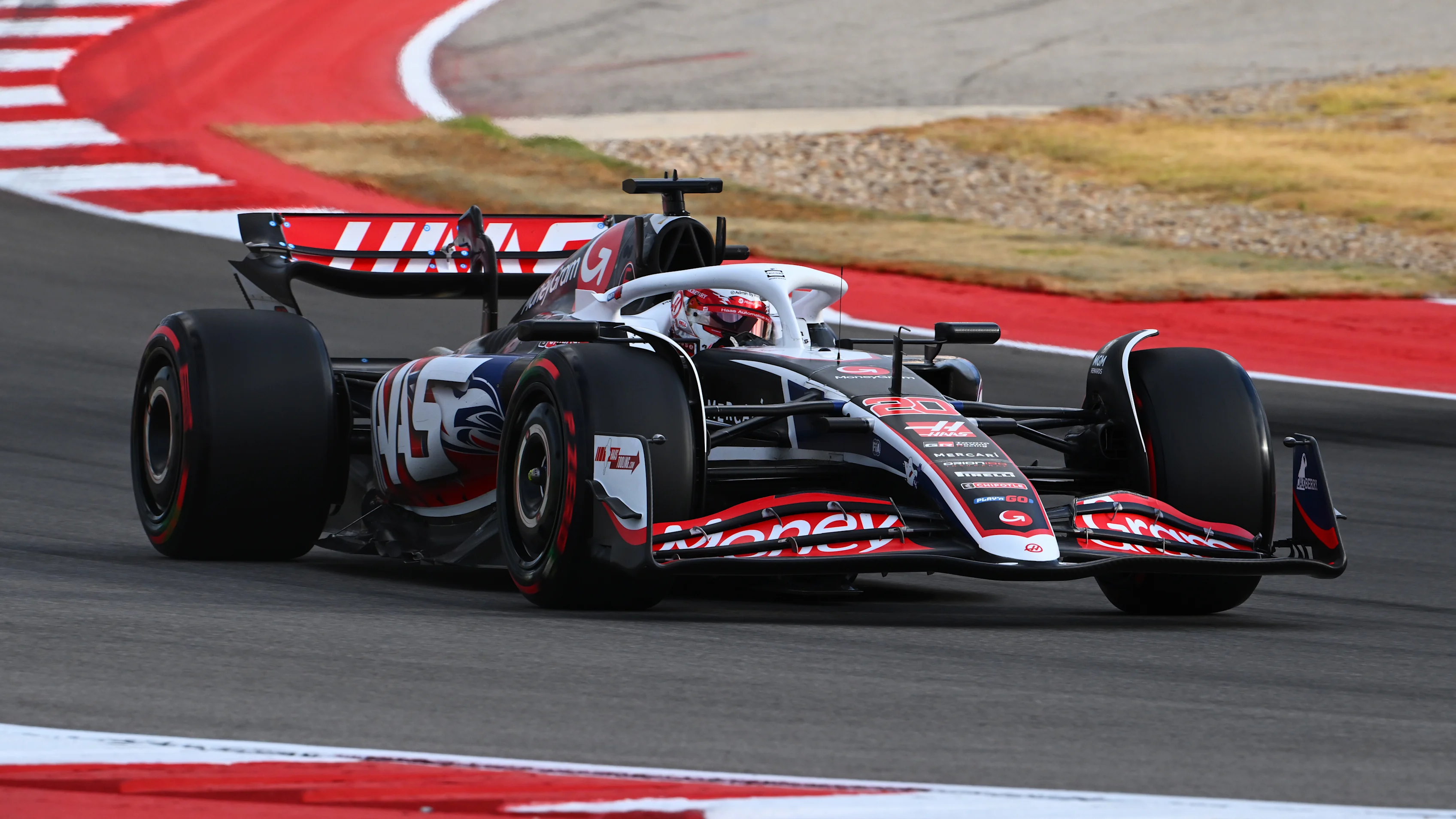 AUSTIN, TEXAS - OCTOBER 18: Kevin Magnussen of Denmark driving the (20) Haas F1 VF-24 Ferrari on
