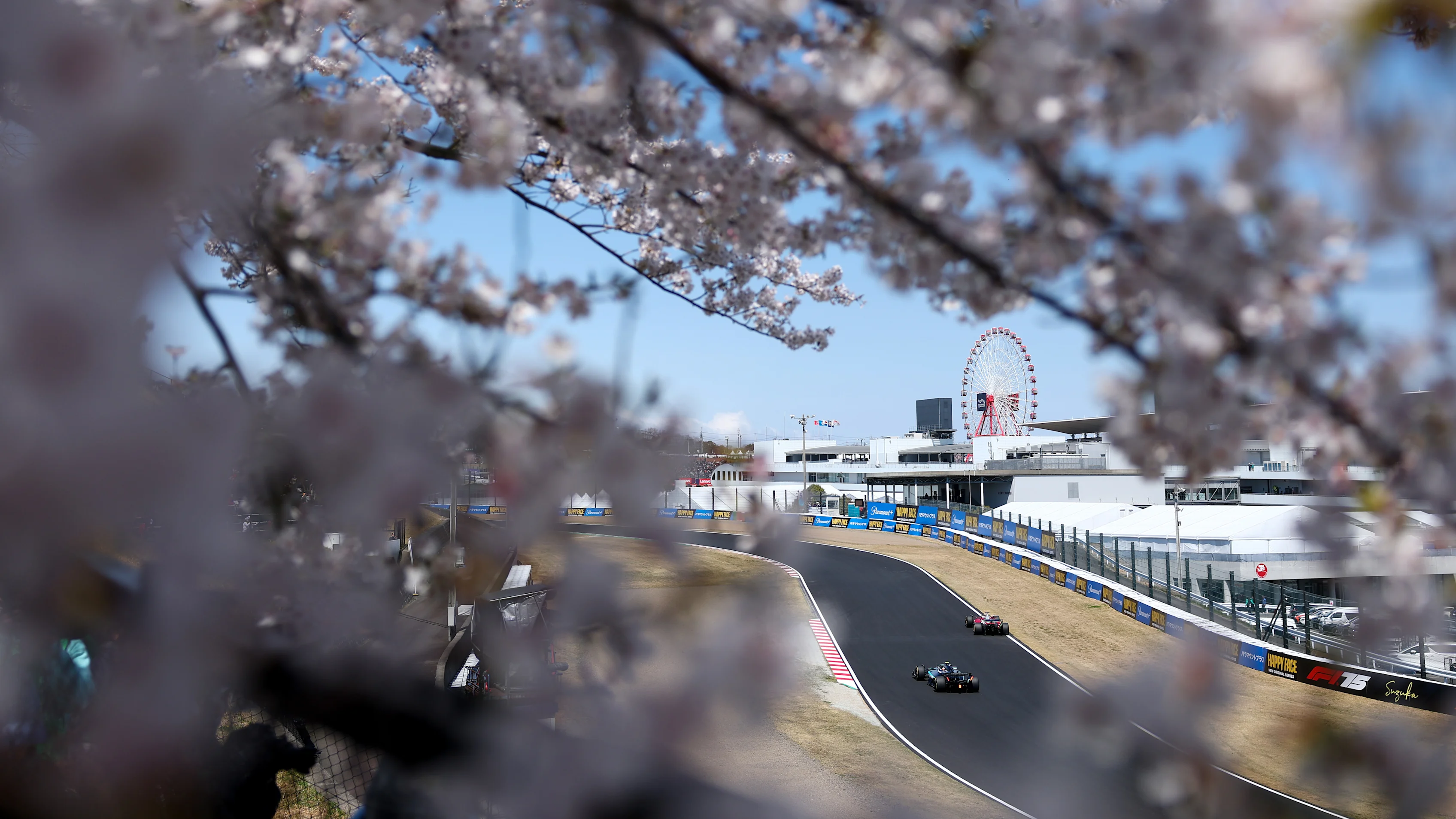 SUZUKA, JAPAN - APRIL 04: Charles Leclerc of Monaco driving the (16) Scuderia Ferrari SF-25 leads