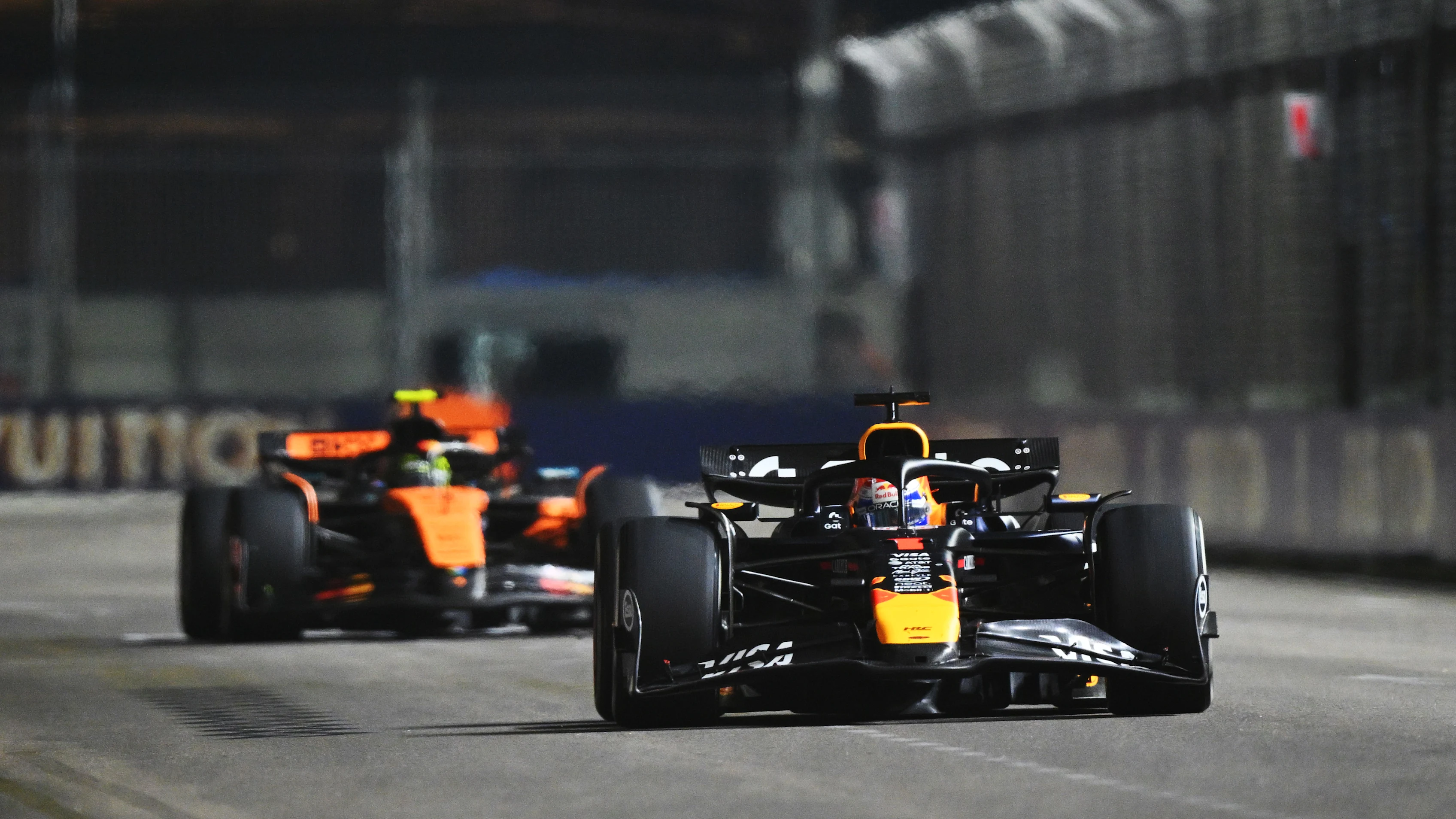 SINGAPORE, SINGAPORE - OCTOBER 05: Max Verstappen of the Netherlands driving the (1) Oracle Red
