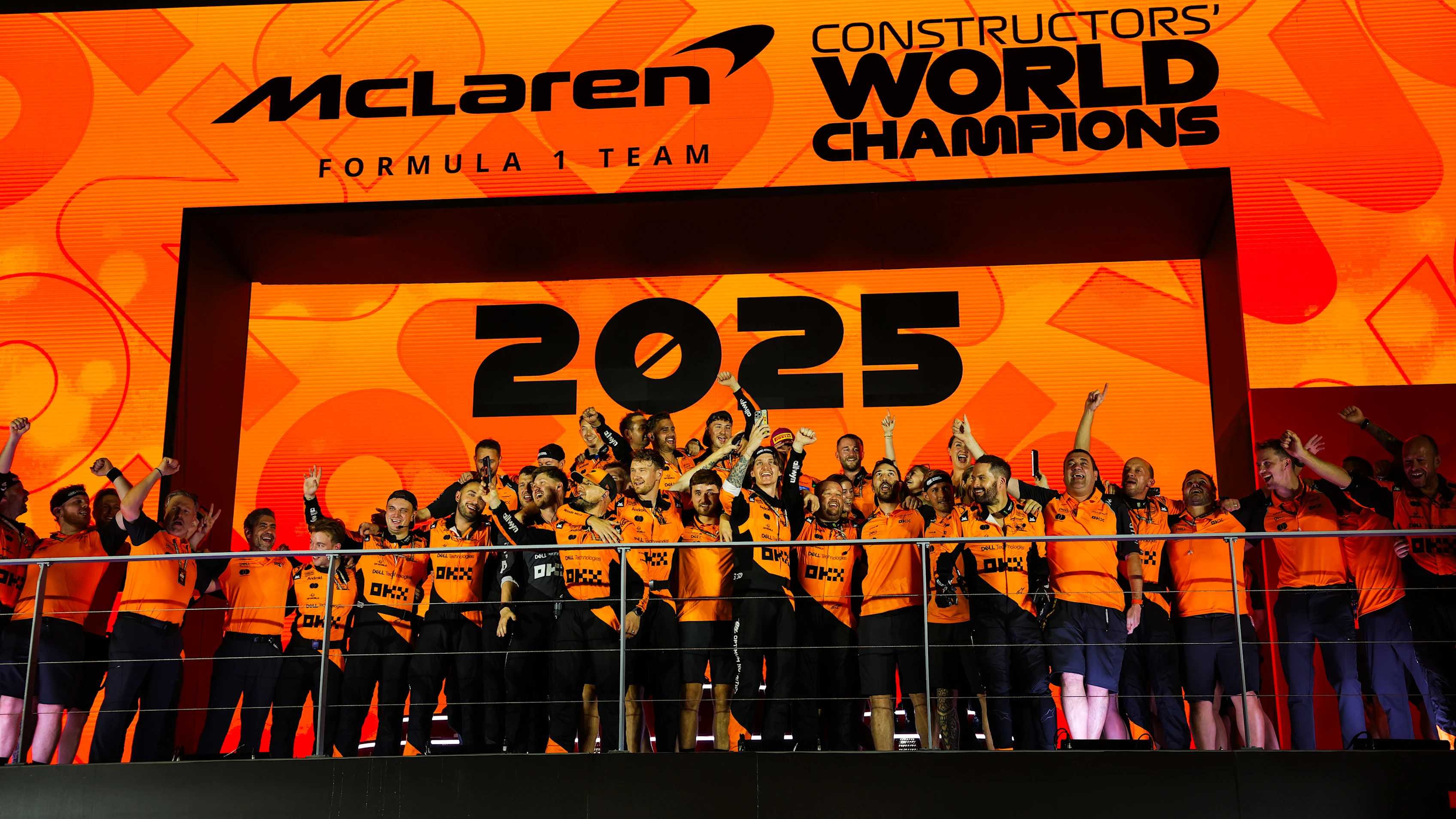 SINGAPORE, SINGAPORE - OCTOBER 05: The McLaren team celebrate victory in the Constructors