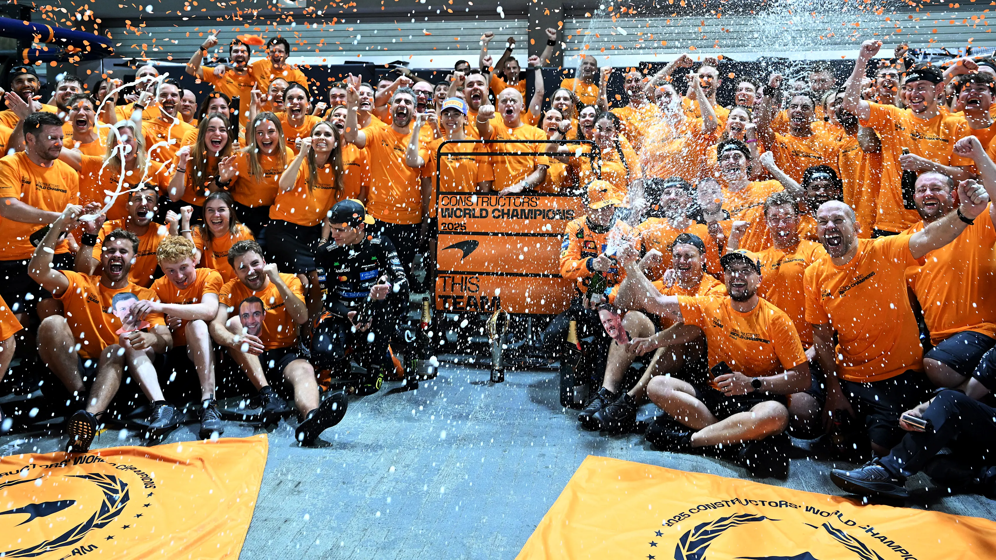 SINGAPORE, SINGAPORE - OCTOBER 05: Lando Norris of Great Britain and McLaren Oscar Piastri of