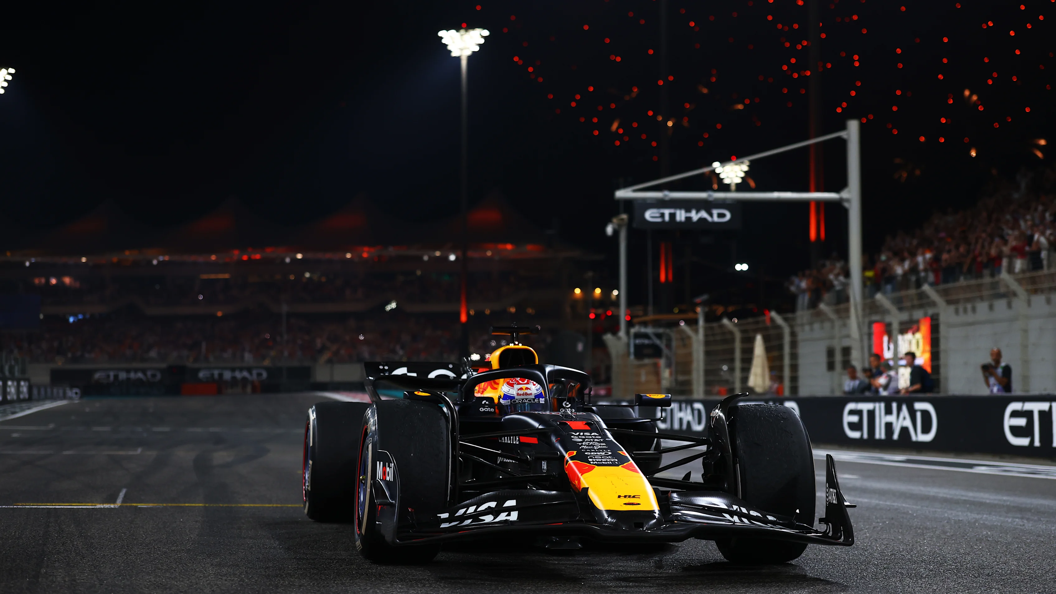 ABU DHABI, UNITED ARAB EMIRATES - DECEMBER 07: Race winner Max Verstappen of the Netherlands driving the (1) Oracle Red Bull Racing RB21 arrives in parc ferme during the F1 Grand Prix of Abu Dhabi at Yas Marina Circuit on December 07, 2025 in Abu Dhabi, United Arab Emirates. (Photo by Bryn Lennon - Formula 1/Formula 1 via Getty Images)