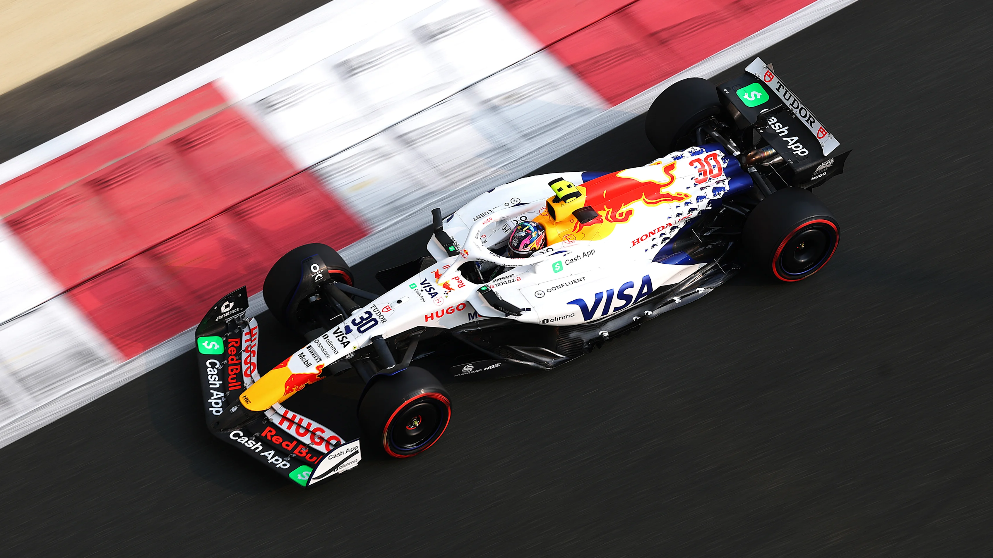 ABU DHABI, UNITED ARAB EMIRATES - DECEMBER 06: Liam Lawson of New Zealand driving the (30) Visa