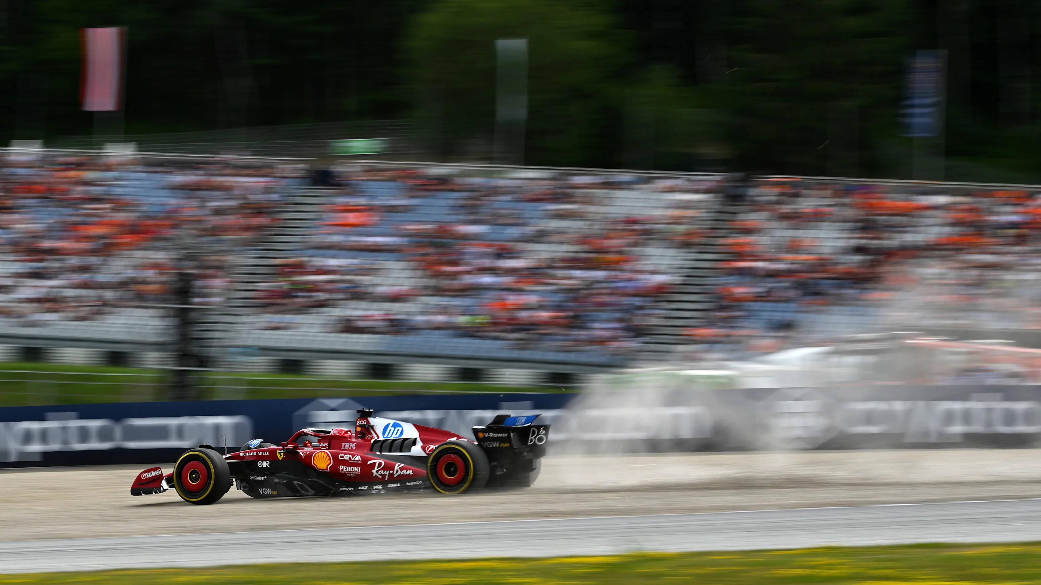 SPIELBERG, AUSTRIA - JUNE 27: Charles Leclerc of Monaco driving the (16) Scuderia Ferrari SF-25 in the gravel during practice ahead of the F1 Grand Prix of Austria at Red Bull Ring on June 27, 2025 in Spielberg, Austria. (Photo by Rudy Carezzevoli/Getty Images)