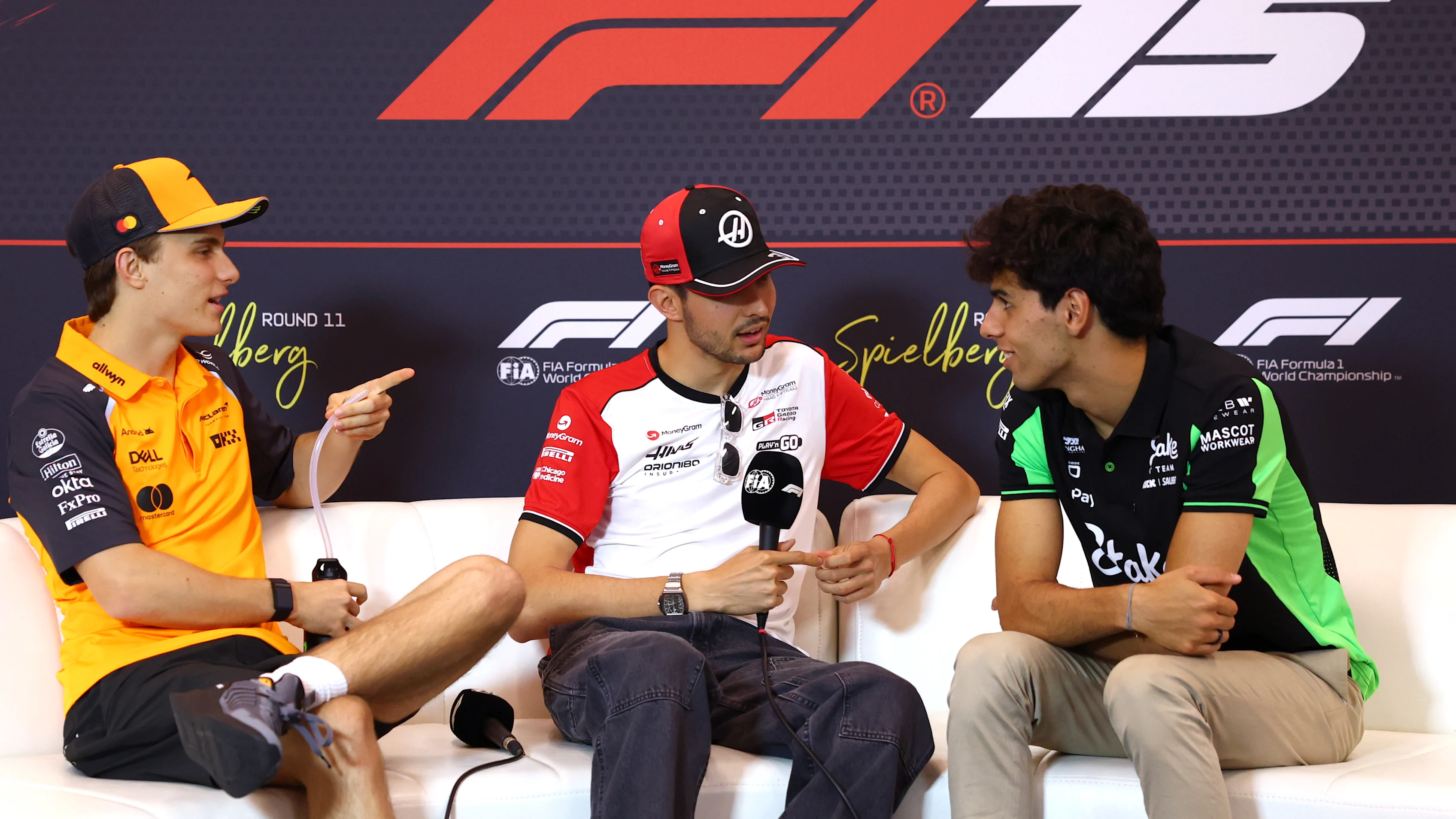 SPIELBERG, AUSTRIA - JUNE 26: Oscar Piastri of Australia and McLaren Esteban Ocon of France and