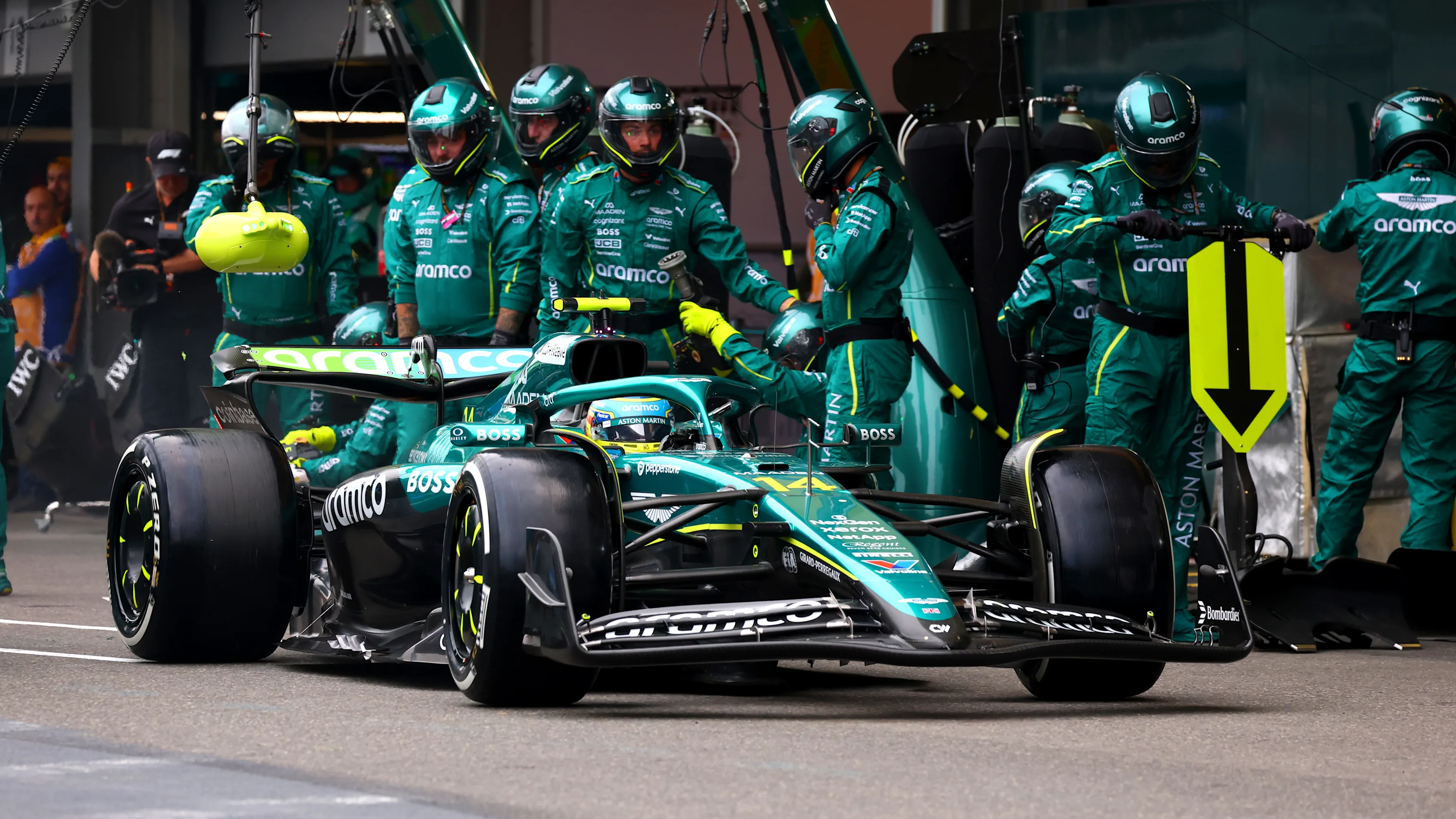 BAKU, AZERBAIJAN - SEPTEMBER 21: Fernando Alonso of Spain driving the (14) Aston Martin F1 Team AMR25 Mercedes makes a pitstop during the F1 Grand Prix of Azerbaijan at Baku City Circuit on September 21, 2025 in Baku, Azerbaijan. (Photo by Mark Thompson/Getty Images)