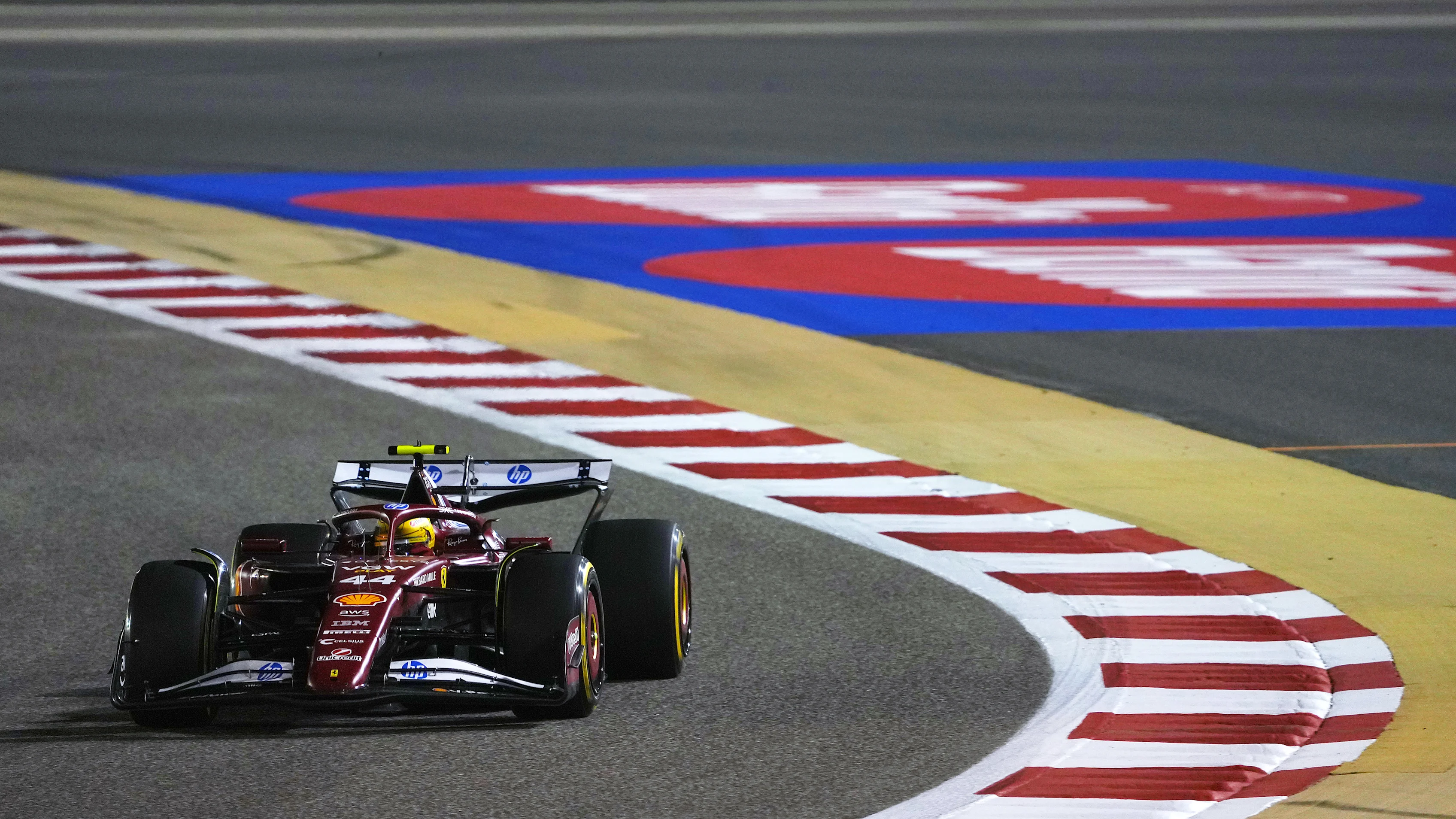 BAHRAIN, BAHRAIN - APRIL 13: Lewis Hamilton of Great Britain driving the (44) Scuderia Ferrari