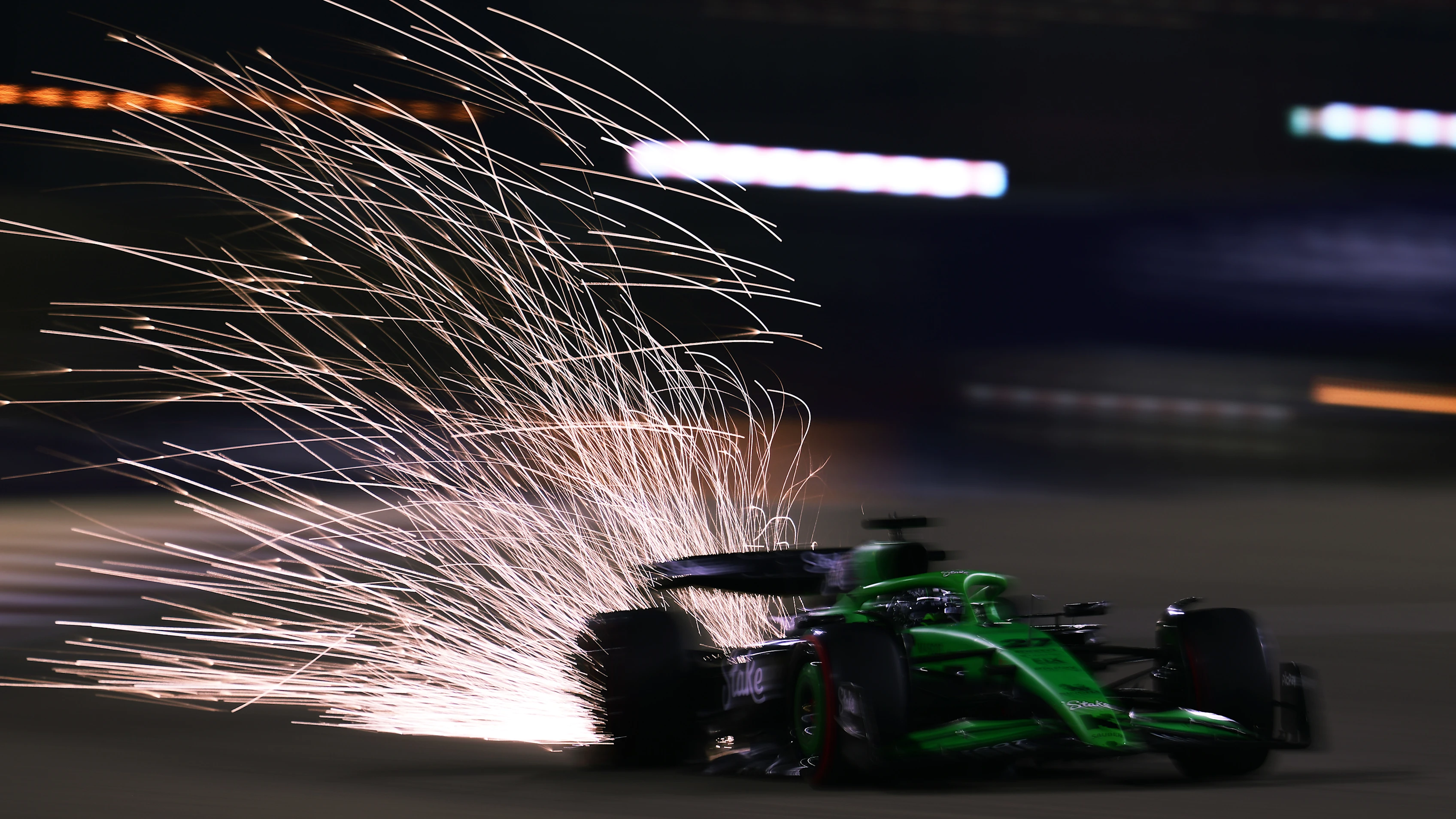 BAHRAIN, BAHRAIN - APRIL 12: Sparks fly behind Nico Hulkenberg of Germany driving the (27) Kick Sauber C45 Ferrari on track during qualifying ahead of the F1 Grand Prix of Bahrain at Bahrain International Circuit on April 12, 2025 in Bahrain, Bahrain. (Photo by Mario Renzi - Formula 1/Formula 1 via Getty Images)