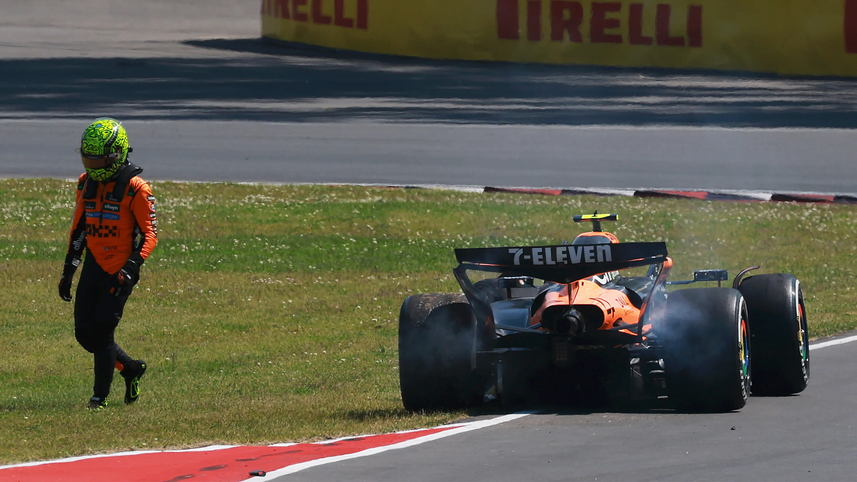 MONTREAL, QUEBEC - JUNE 15: Lando Norris of Great Britain and McLaren walks away from his damaged
