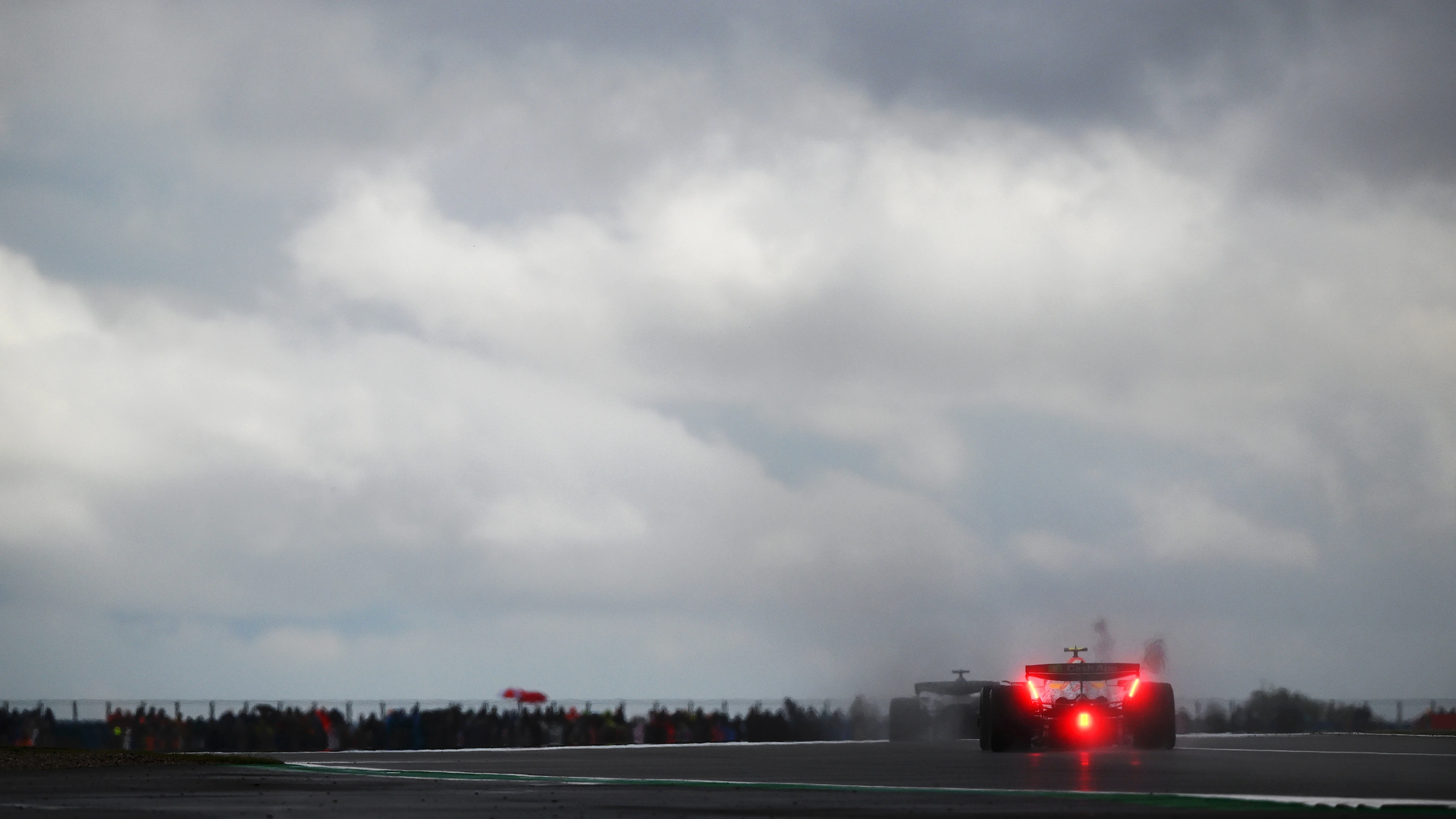 NORTHAMPTON, ENGLAND - JULY 06: Liam Lawson of New Zealand driving the (30) Visa Cash App Racing Bulls VCARB 02 heads to the grid prior to the F1 Grand Prix of Great Britain at Silverstone Circuit on July 06, 2025 in Northampton, England. (Photo by Clive Mason/Getty Images)