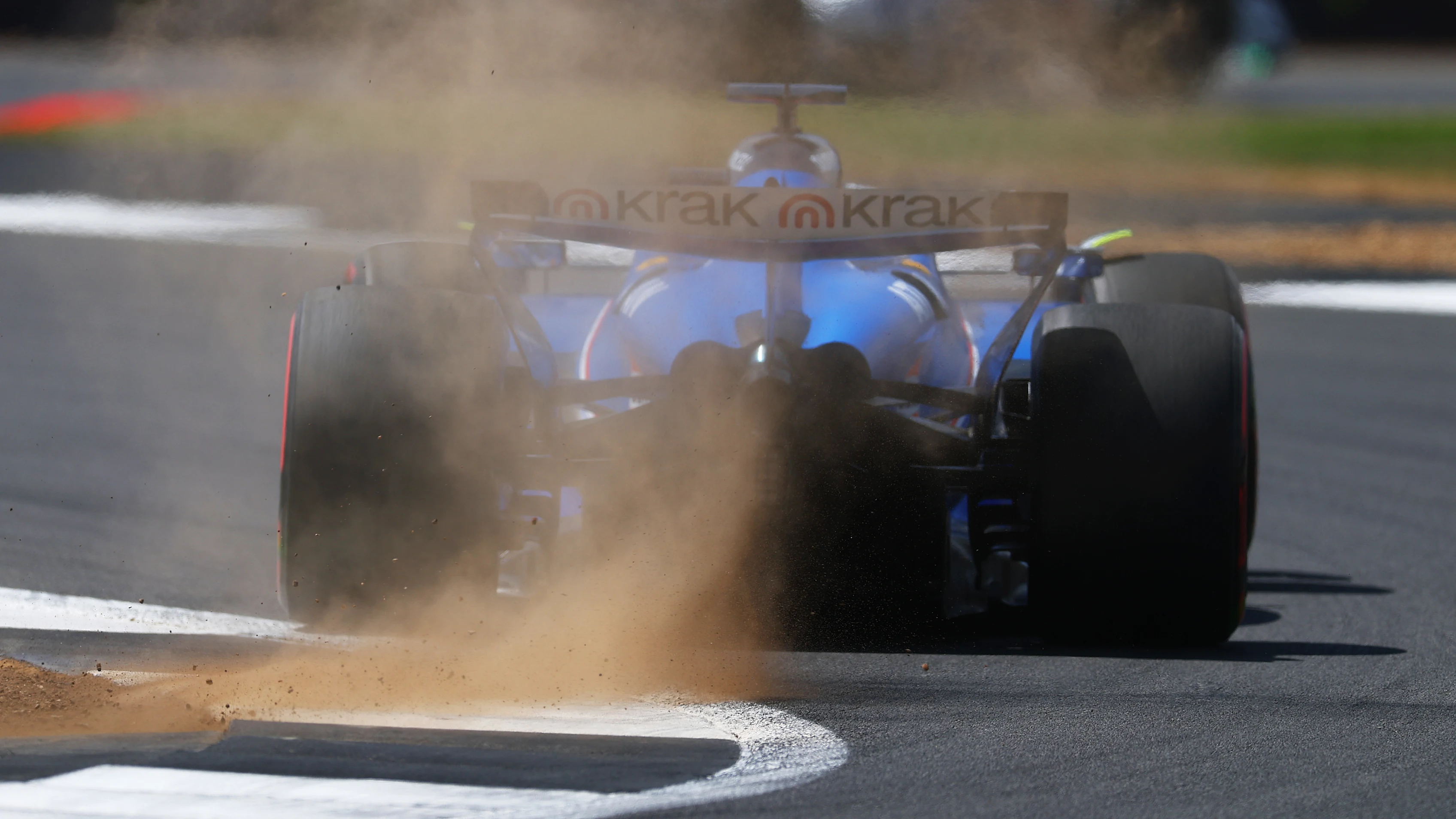 NORTHAMPTON, ENGLAND - JULY 04: Alexander Albon of Thailand driving the (23) Williams FW47 Mercedes kicks up gravel on track during practice ahead of the F1 Grand Prix of Great Britain at Silverstone Circuit on July 04, 2025 in Northampton, England. (Photo by Bryn Lennon - Formula 1/Formula 1 via Getty Images)