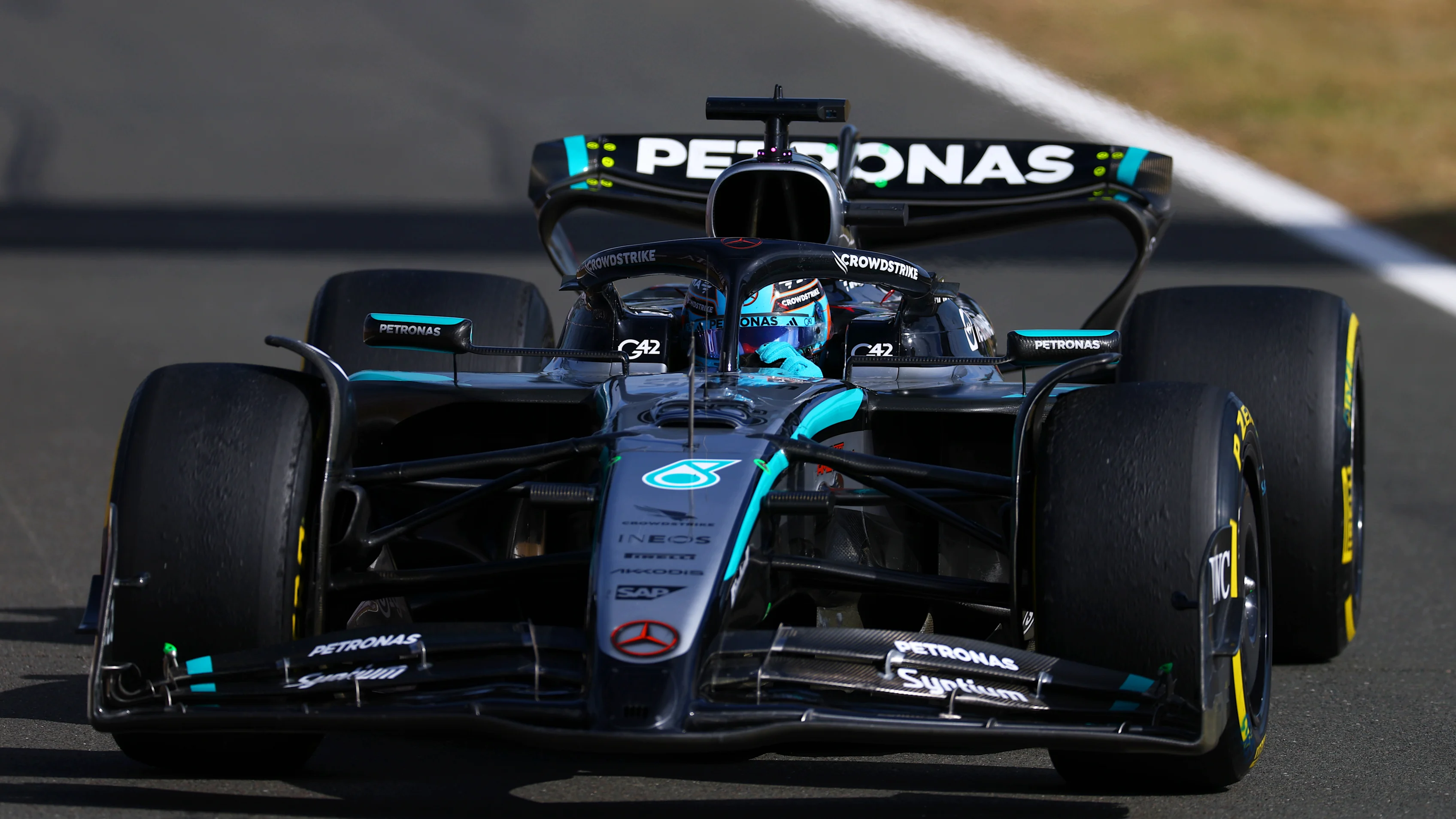 NORTHAMPTON, ENGLAND - JULY 04: George Russell of Great Britain driving the (63) Mercedes AMG