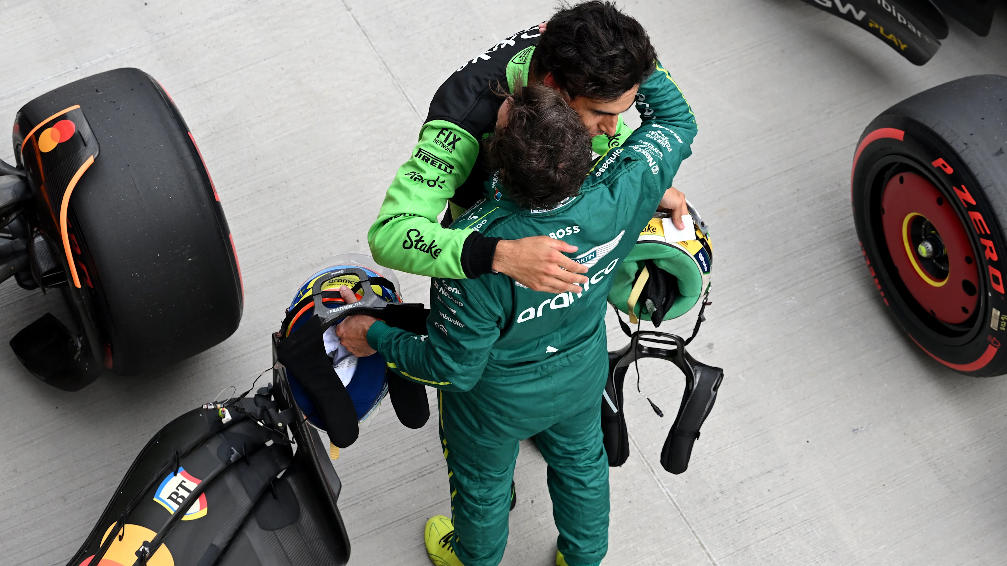 BUDAPEST, HUNGARY - AUGUST 02: Fifth placed qualifier Fernando Alonso of Spain and Aston Martin F1 Team and Seventh placed qualifier Gabriel Bortoleto of Brazil and Stake F1 Team Kick Sauber congratulate each other in parc ferme during qualifying ahead of the F1 Grand Prix of Hungary at Hungaroring on August 02, 2025 in Budapest, Hungary. (Photo by Mark Sutton - Formula 1/Formula 1 via Getty Images)