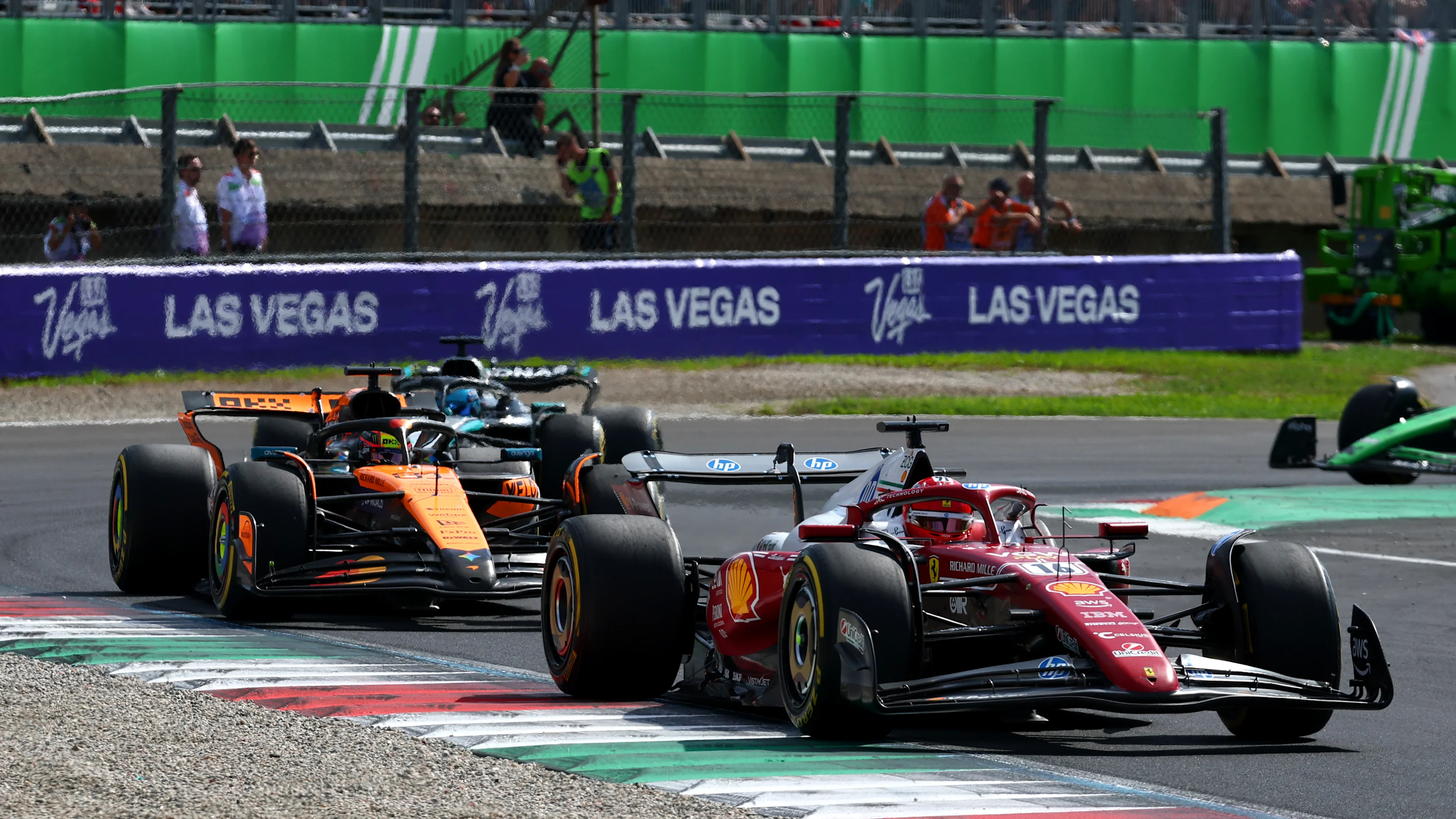 MONZA, ITALY - SEPTEMBER 07: Charles Leclerc of Monaco driving the (16) Scuderia Ferrari SF-25 leads Oscar Piastri of Australia driving the (81) McLaren MCL39 Mercedes on track during the F1 Grand Prix of Italy at Autodromo Nazionale Monza on September 07, 2025 in Monza, Italy. (Photo by Clive Rose/Getty Images)