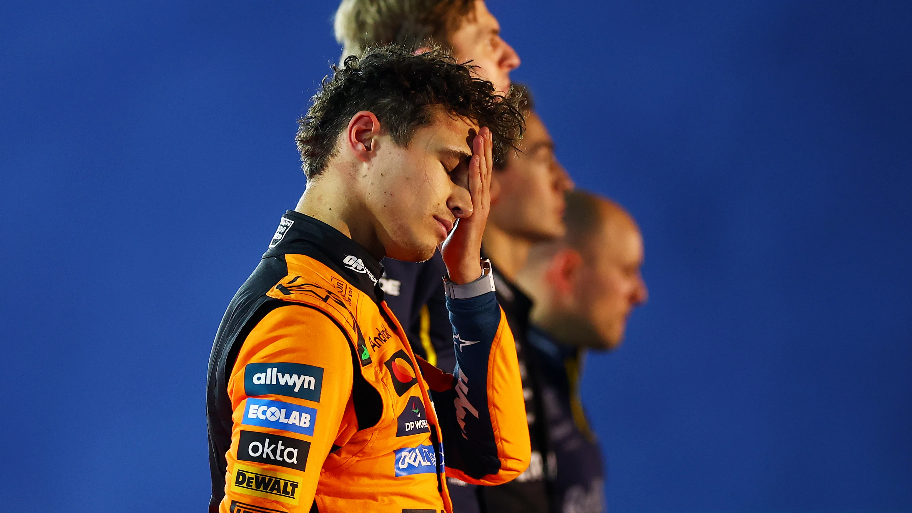 LAS VEGAS, NEVADA - NOVEMBER 22: Second placed Lando Norris of Great Britain and McLaren on the podium during the F1 Grand Prix of Las Vegas at Las Vegas Strip Circuit on November 22, 2025 in Las Vegas, Nevada. (Photo by Bryn Lennon - Formula 1/Formula 1 via Getty Images)