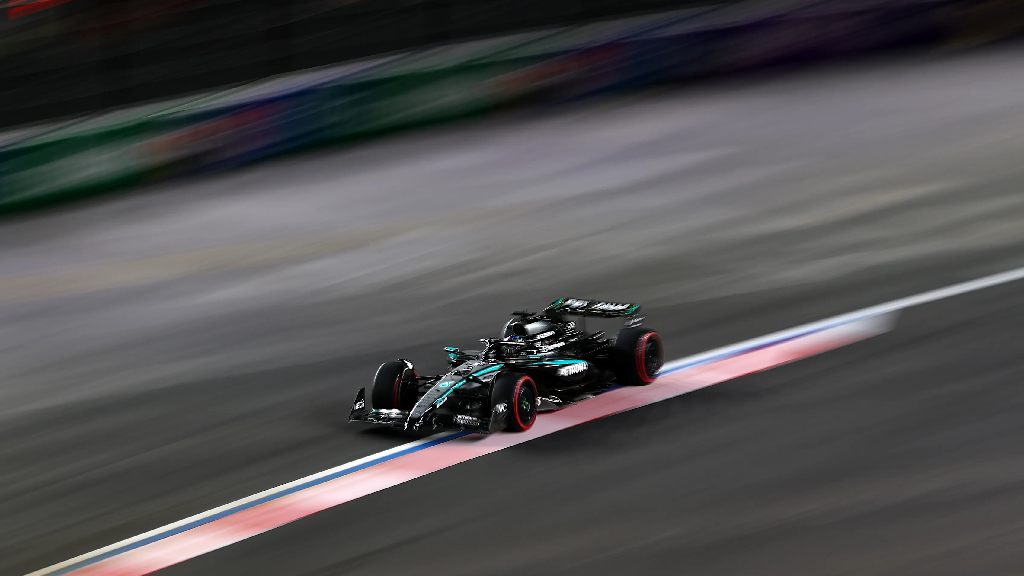 LAS VEGAS, NEVADA - NOVEMBER 20: George Russell of Great Britain driving the (63) Mercedes AMG Petronas F1 Team W16 on track during practice ahead of the F1 Grand Prix of Las Vegas at Las Vegas Strip Circuit on November 20, 2025 in Las Vegas, Nevada. (Photo by Bryn Lennon - Formula 1/Formula 1 via Getty Images)