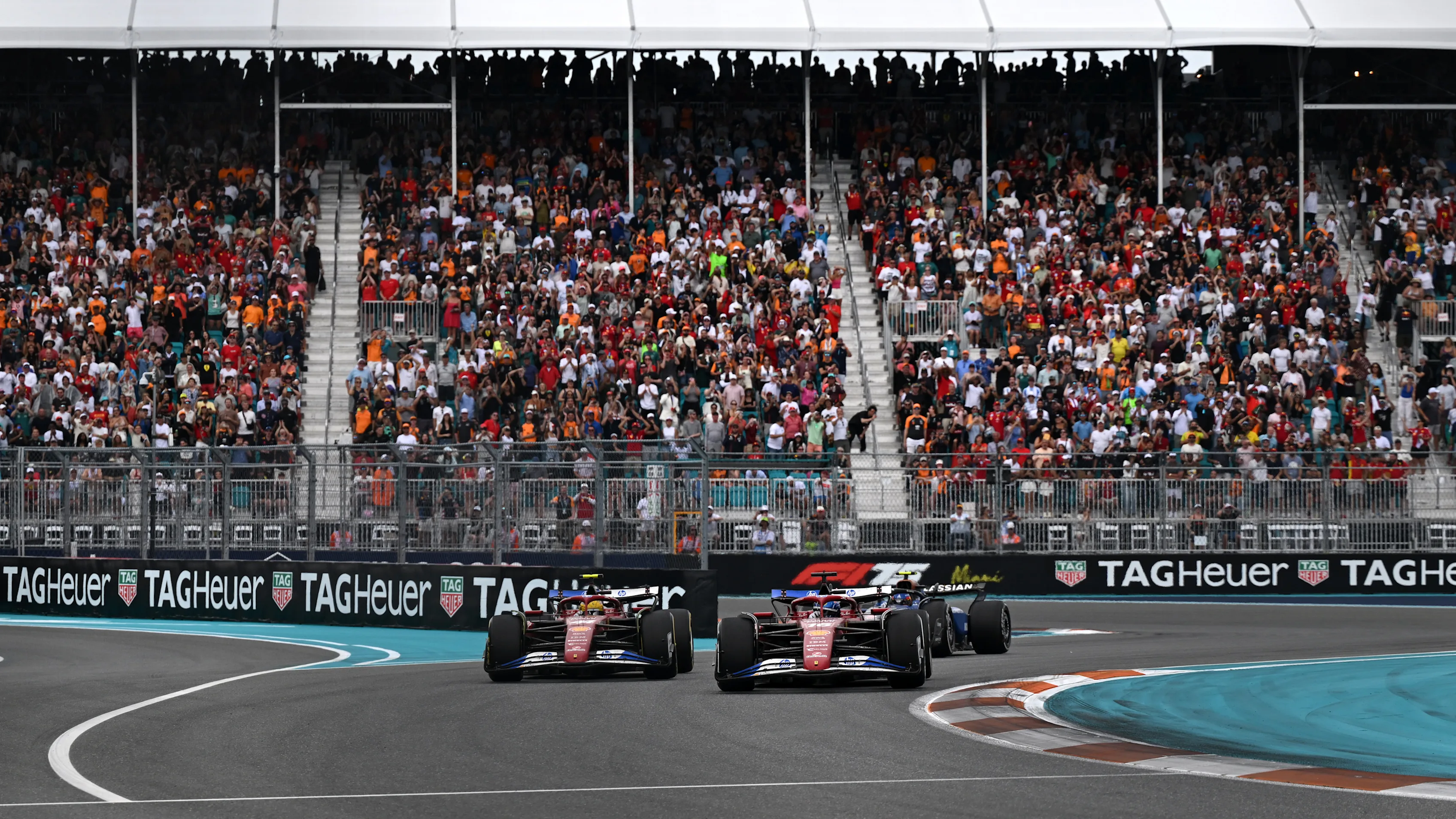 MIAMI, FLORIDA - MAY 04: Charles Leclerc of Monaco driving the (16) Scuderia Ferrari SF-25 leads