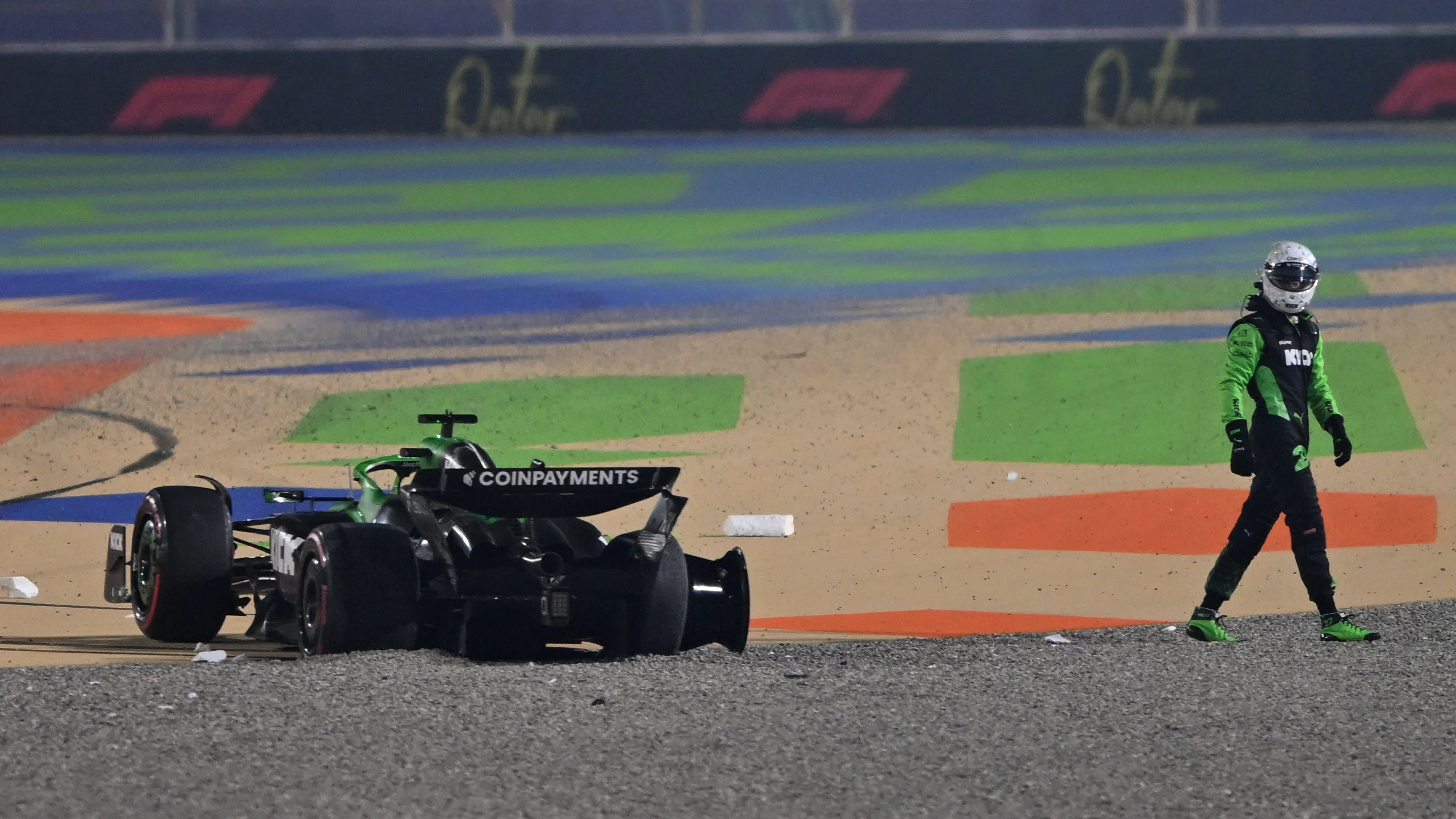 LUSAIL CITY, QATAR - NOVEMBER 30: Nico Hulkenberg of Germany and Stake F1 Team Kick Sauber walks away from his damaged car after a crash during the F1 Grand Prix of Qatar at Lusail International Circuit on November 30, 2025 in Lusail City, Qatar. (Photo by Rudy Carezzevoli/Getty Images)