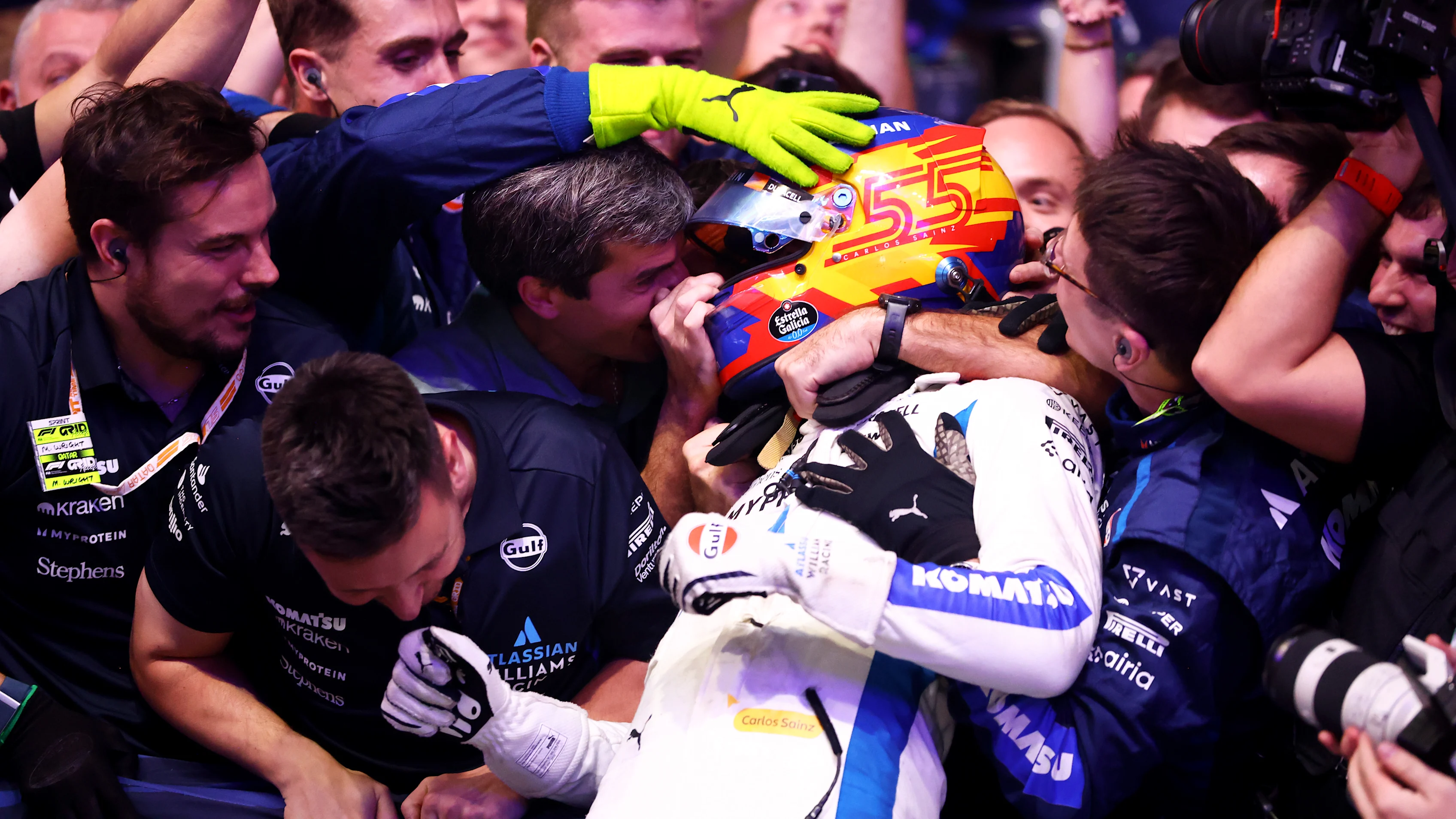LUSAIL CITY, QATAR - NOVEMBER 30: Third placed Carlos Sainz of Spain and Williams celebrates with his team in parc ferme during the F1 Grand Prix of Qatar at Lusail International Circuit on November 30, 2025 in Lusail City, Qatar. (Photo by Peter Fox/Getty Images)