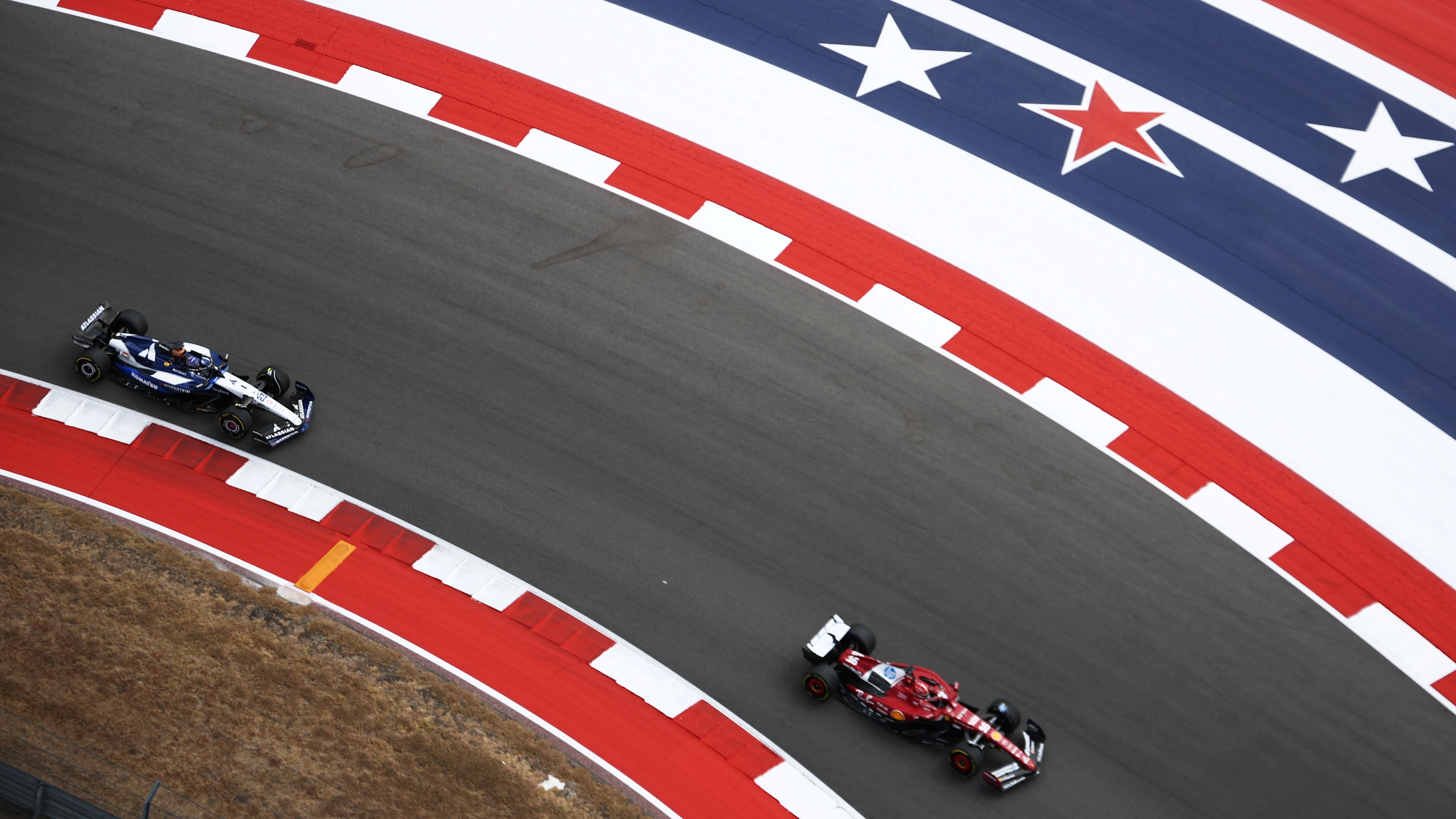 AUSTIN, TEXAS - OCTOBER 18: Charles Leclerc of Monaco driving the (16) Scuderia Ferrari SF-25 leads