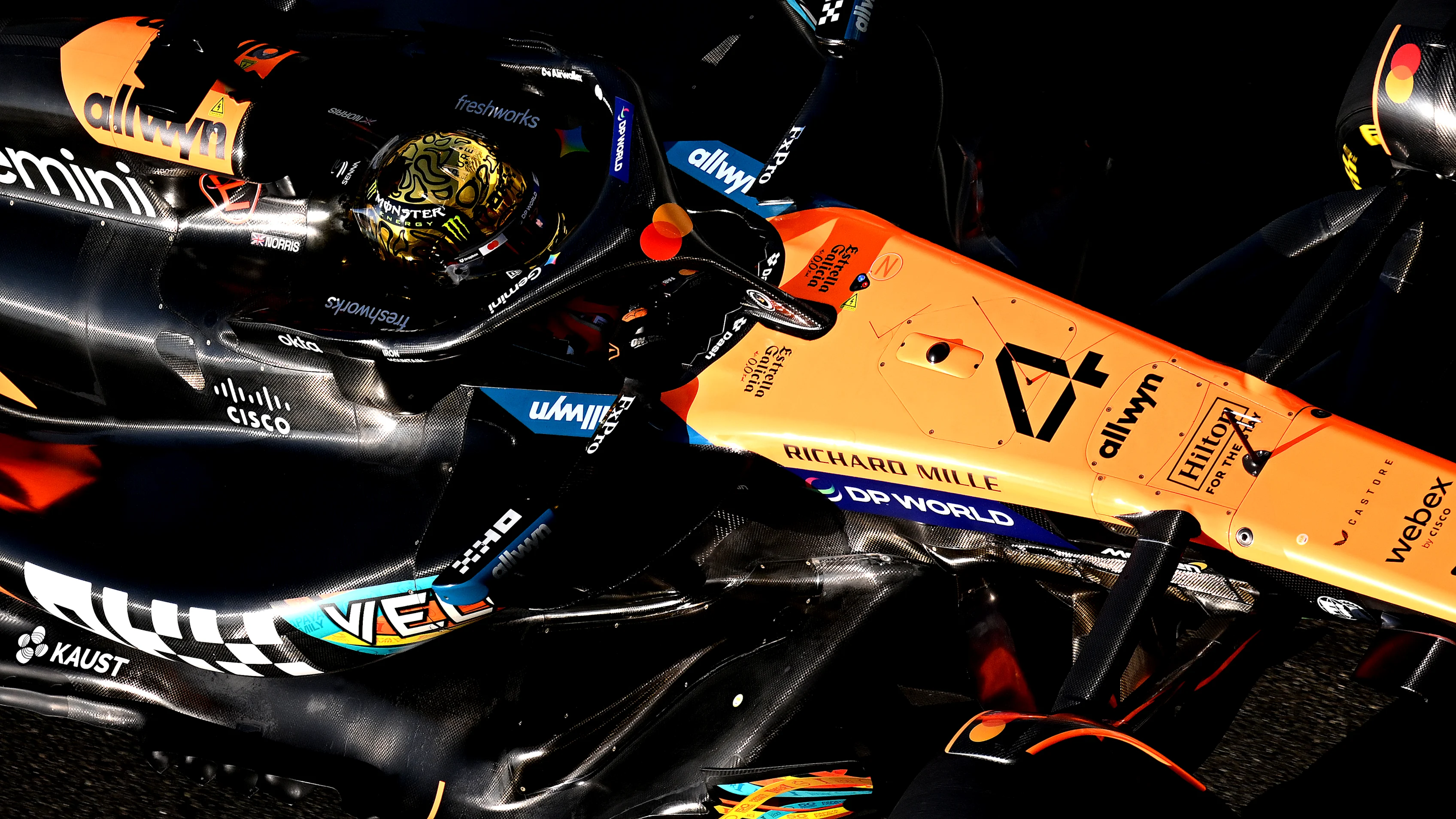 ABU DHABI, UNITED ARAB EMIRATES - DECEMBER 09: Lando Norris of Great Britain driving the (4)