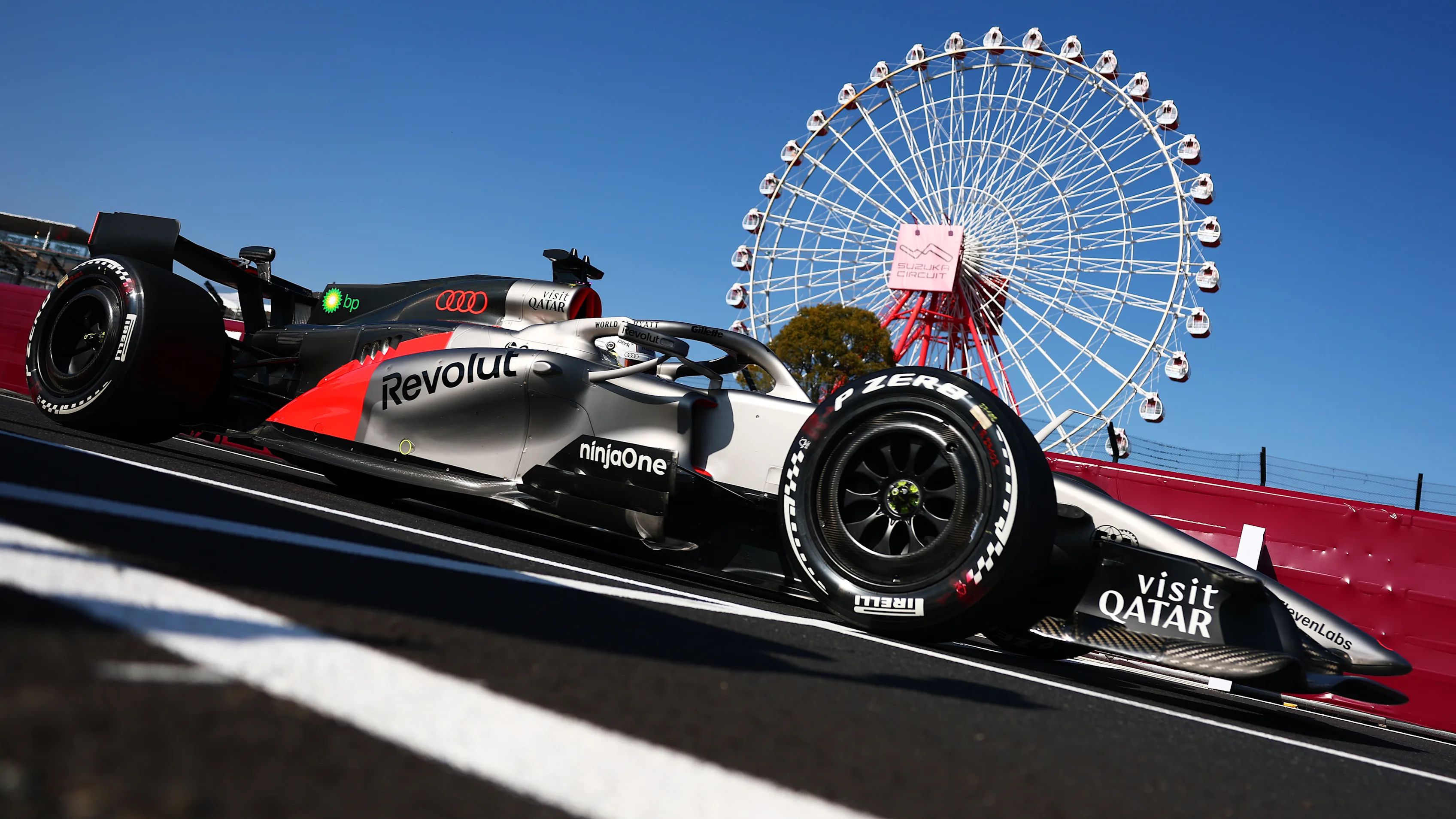 SUZUKA, JAPAN - MARCH 27: Nico Hulkenberg of Germany driving the (27) Audi F1 Team R26 on track