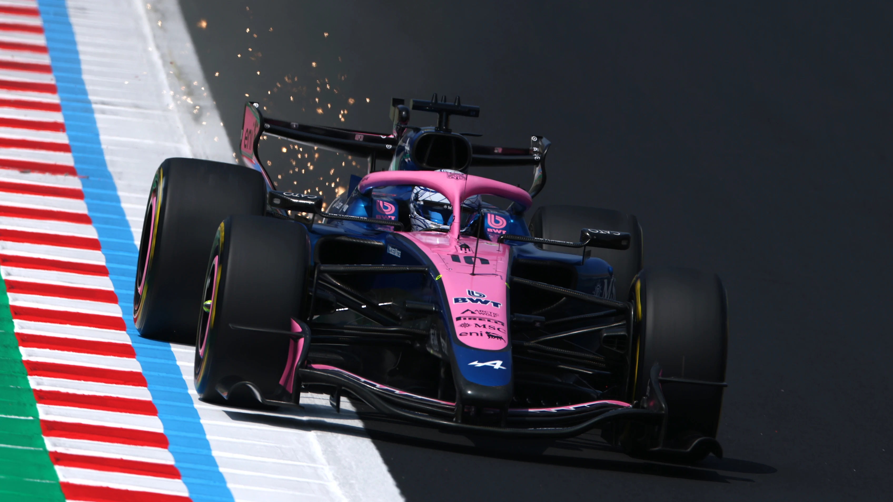 SUZUKA, JAPAN - MARCH 28: Sparks fly behind Pierre Gasly of France driving the (10) Alpine F1 A526 Mercedes on track prior to final practice ahead of the F1 Grand Prix of Japan at Suzuka Circuit on March 28, 2026 in Suzuka, Japan. (Photo by Clive Mason/Getty Images)