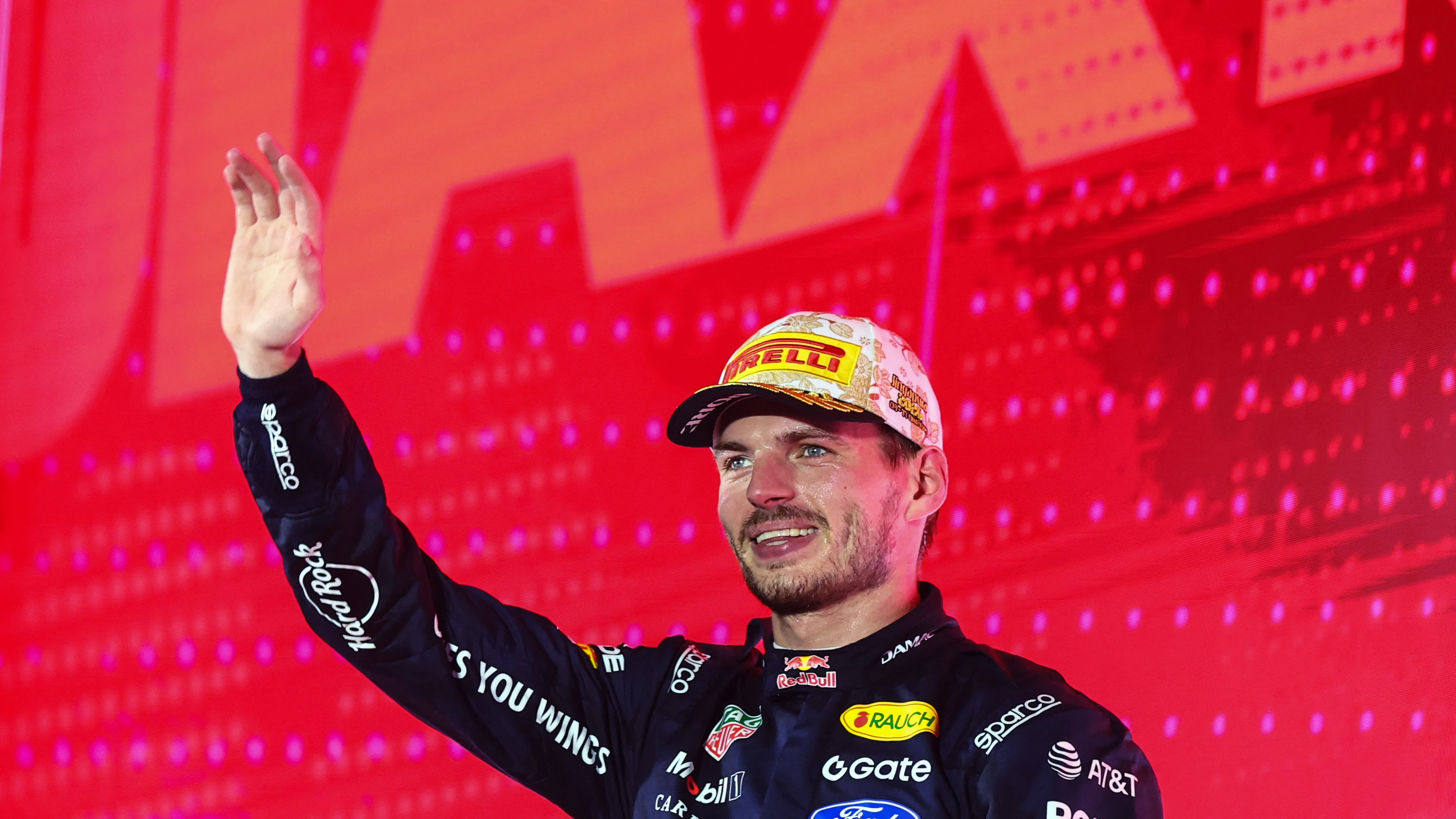 SINGAPORE, SINGAPORE - OCTOBER 11: Race winner Max Verstappen of the Netherlands and Oracle Red