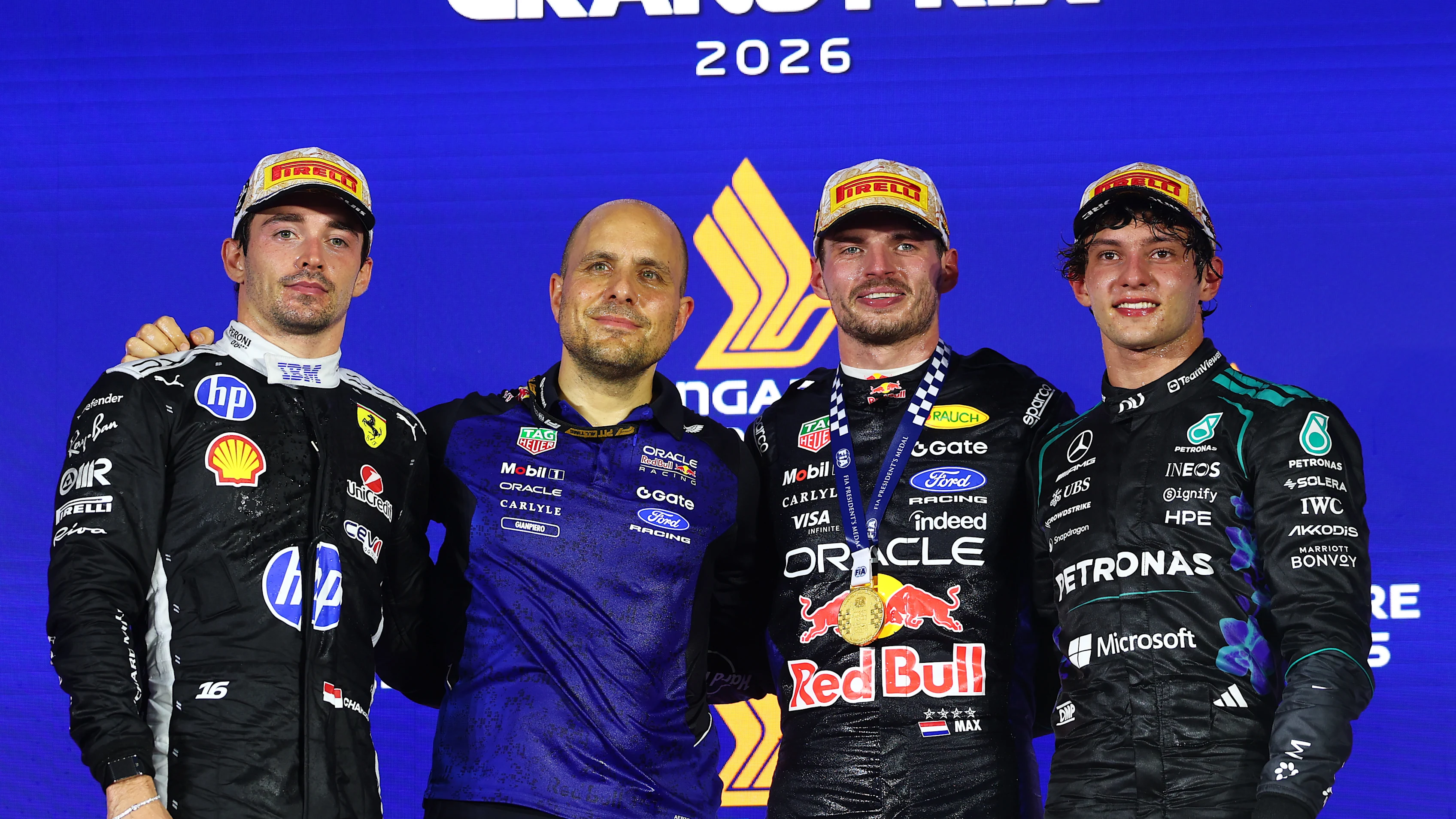 SINGAPORE, SINGAPORE - OCTOBER 11: Race winner Max Verstappen of the Netherlands and Oracle Red