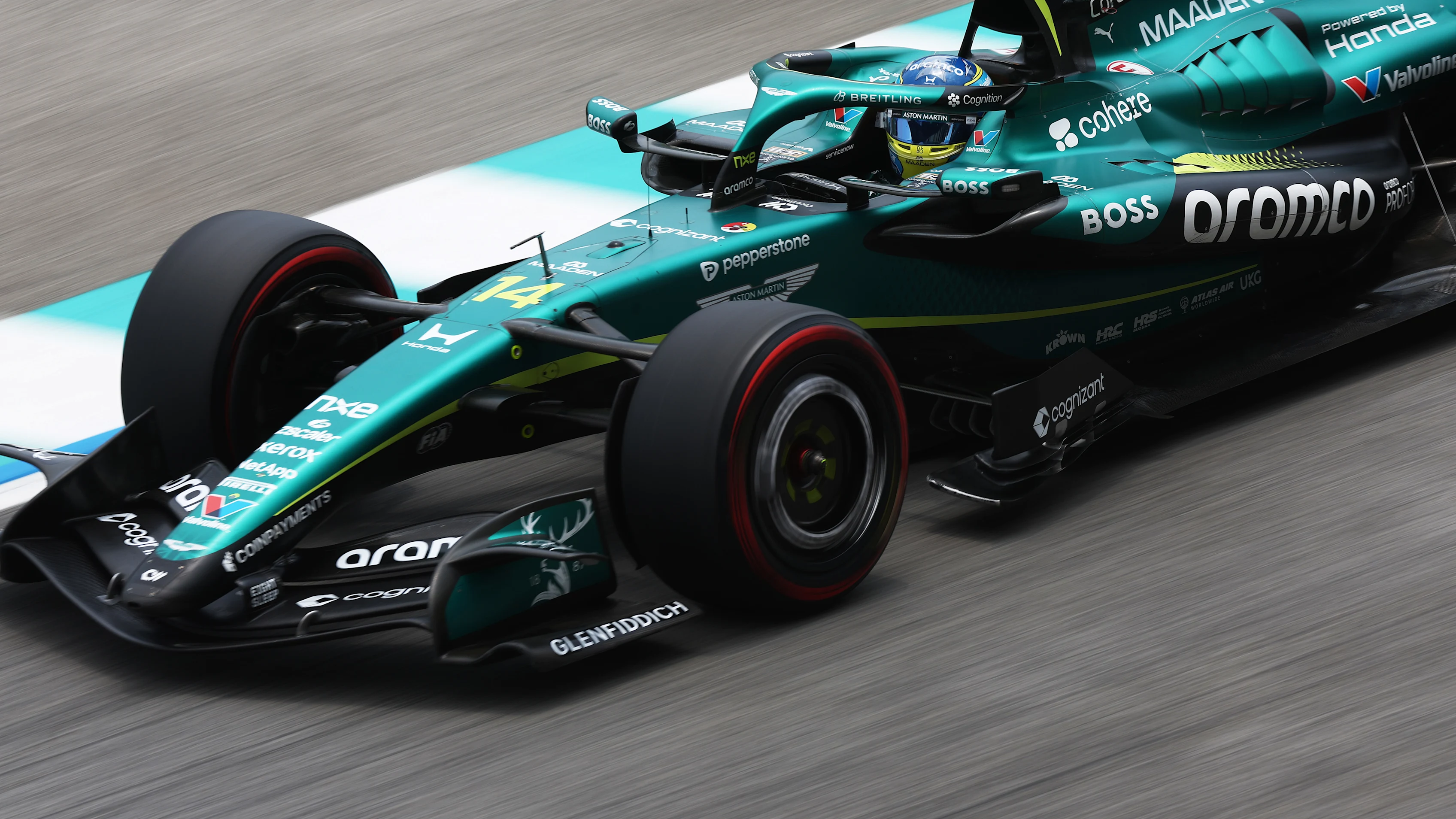 KUALA LUMPUR, MALAYSIA - OCTOBER 03: Fernando Alonso of Spain driving the (14) Aston Martin F1 Team