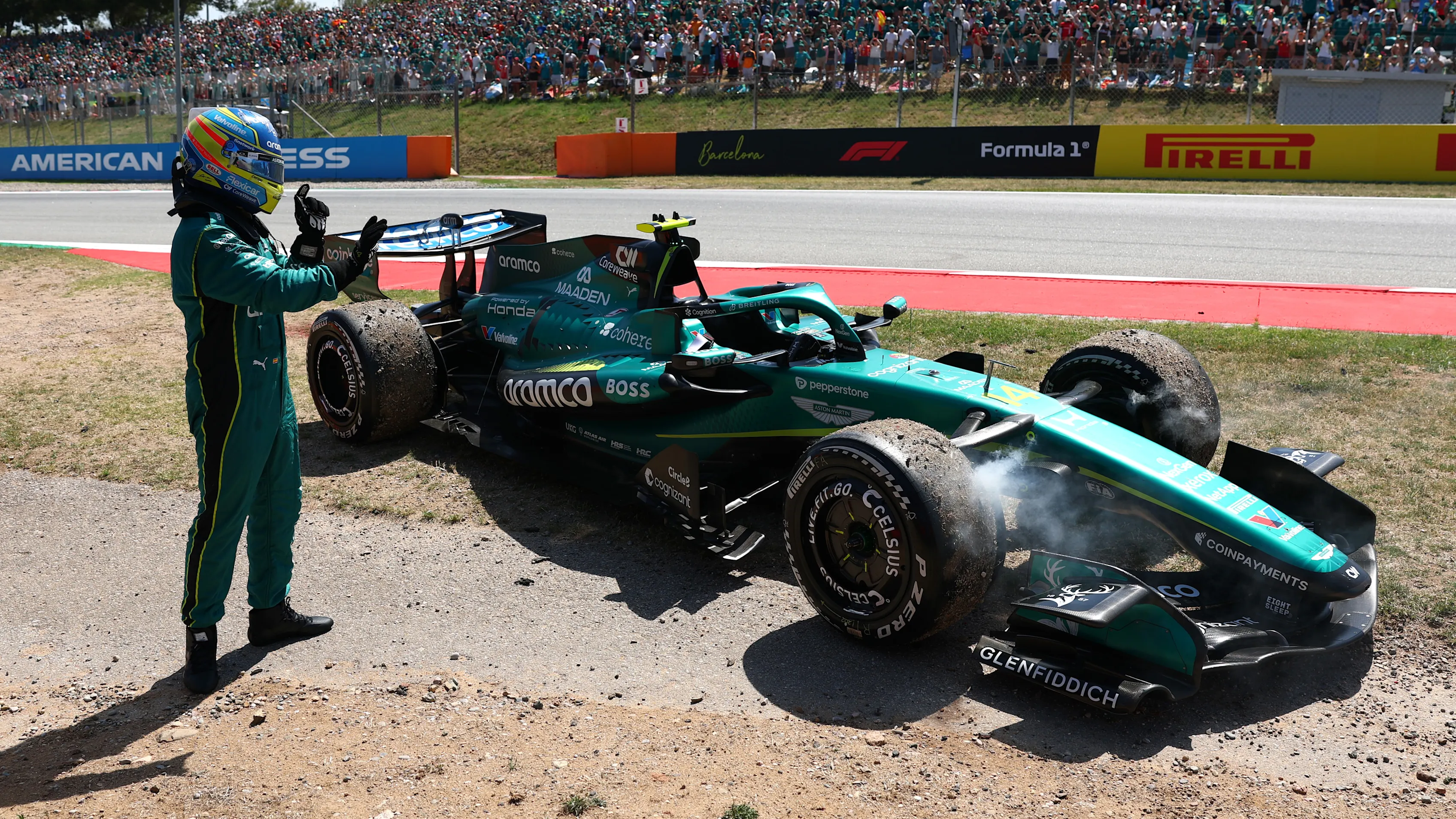 BARCELONA, SPAIN - JUNE 14: Fernando Alonso of Spain and Aston Martin F1 Team retires from therace