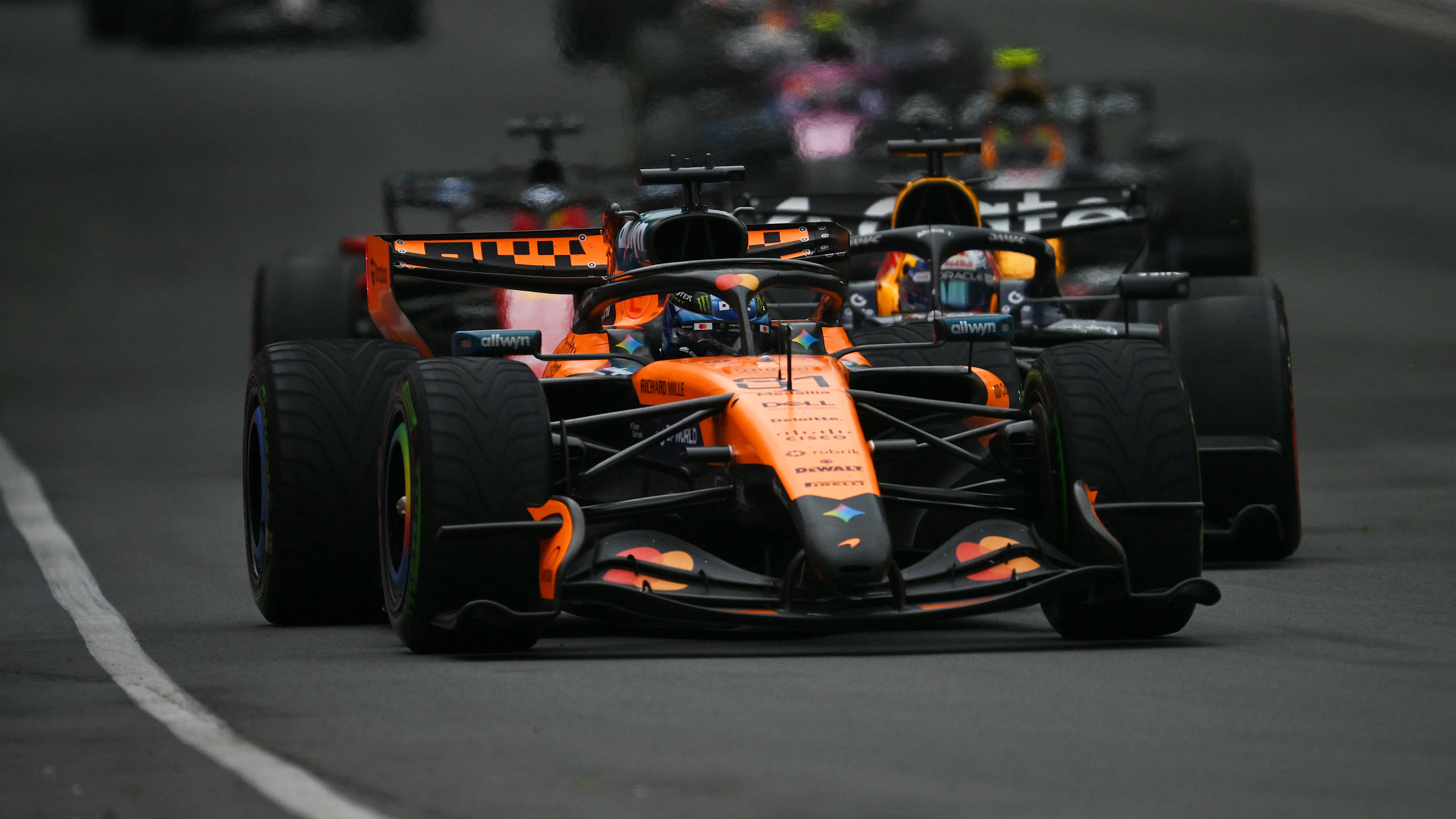 MONTREAL, QUEBEC - MAY 24: Oscar Piastri of Australia driving the (81) McLaren MCL40 Mercedes leads