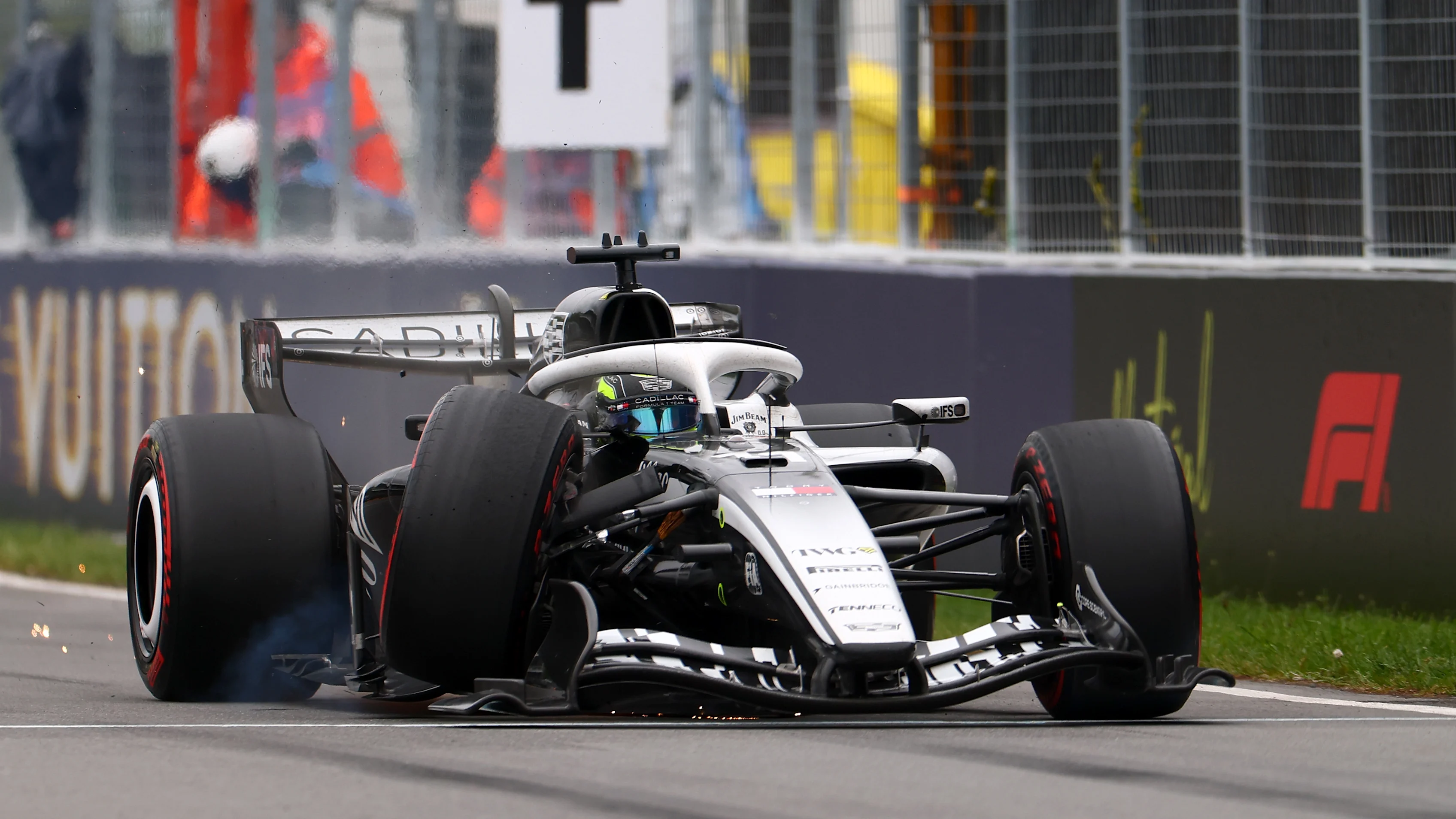 MONTREAL, QUEBEC - MAY 24: Sergio Perez of Mexico driving the (11) Cadillac F1 Team MAC-26 Ferrari crashes out during the F1 Grand Prix of Canada at Circuit Gilles-Villeneuve on May 24, 2026 in Montreal, Quebec. (Photo by Bryn Lennon - Formula 1/Formula 1 via Getty Images)