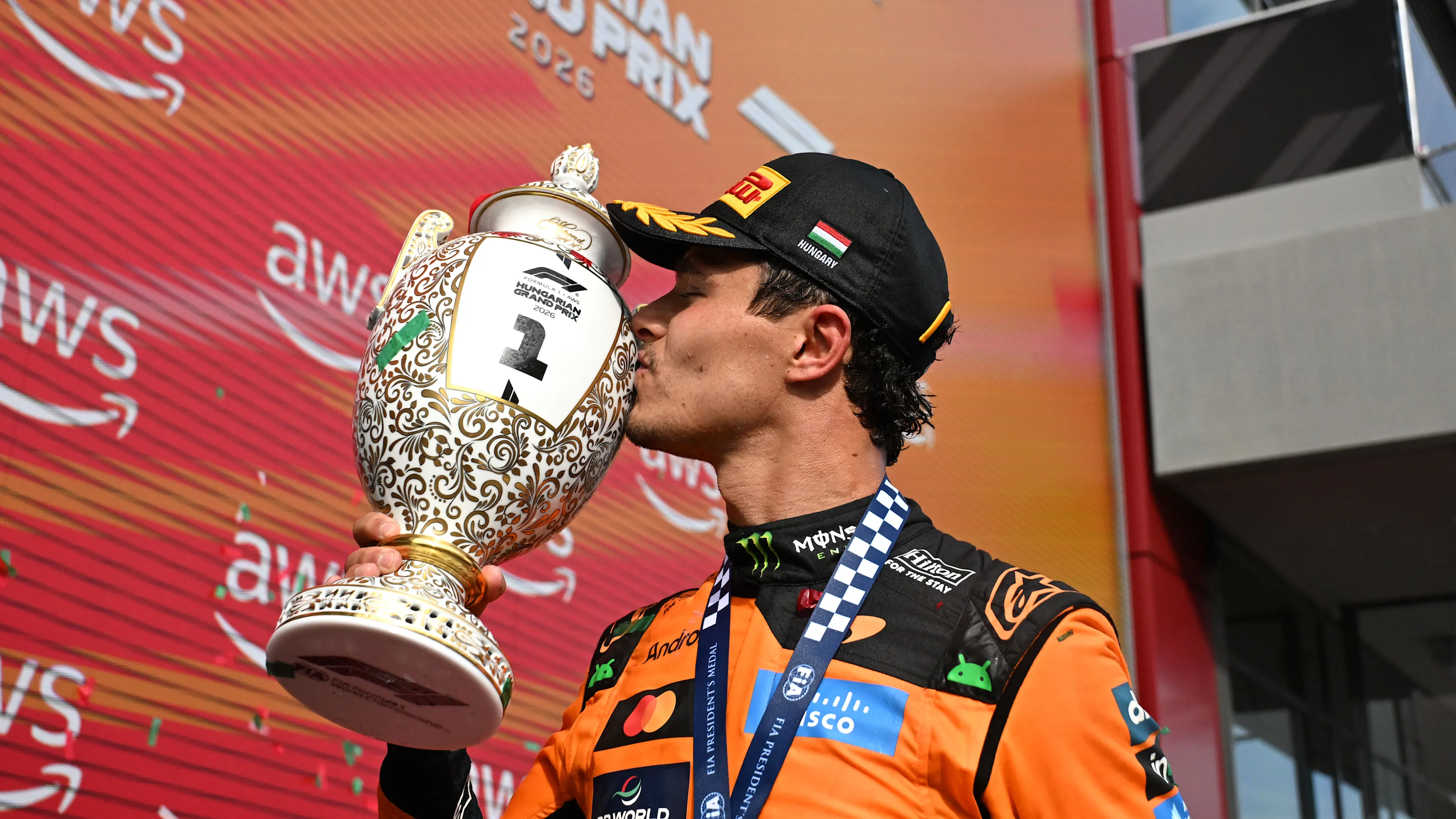 BUDAPEST, HUNGARY - JULY 26: Race winner Lando Norris of Great Britain and McLaren kisses his