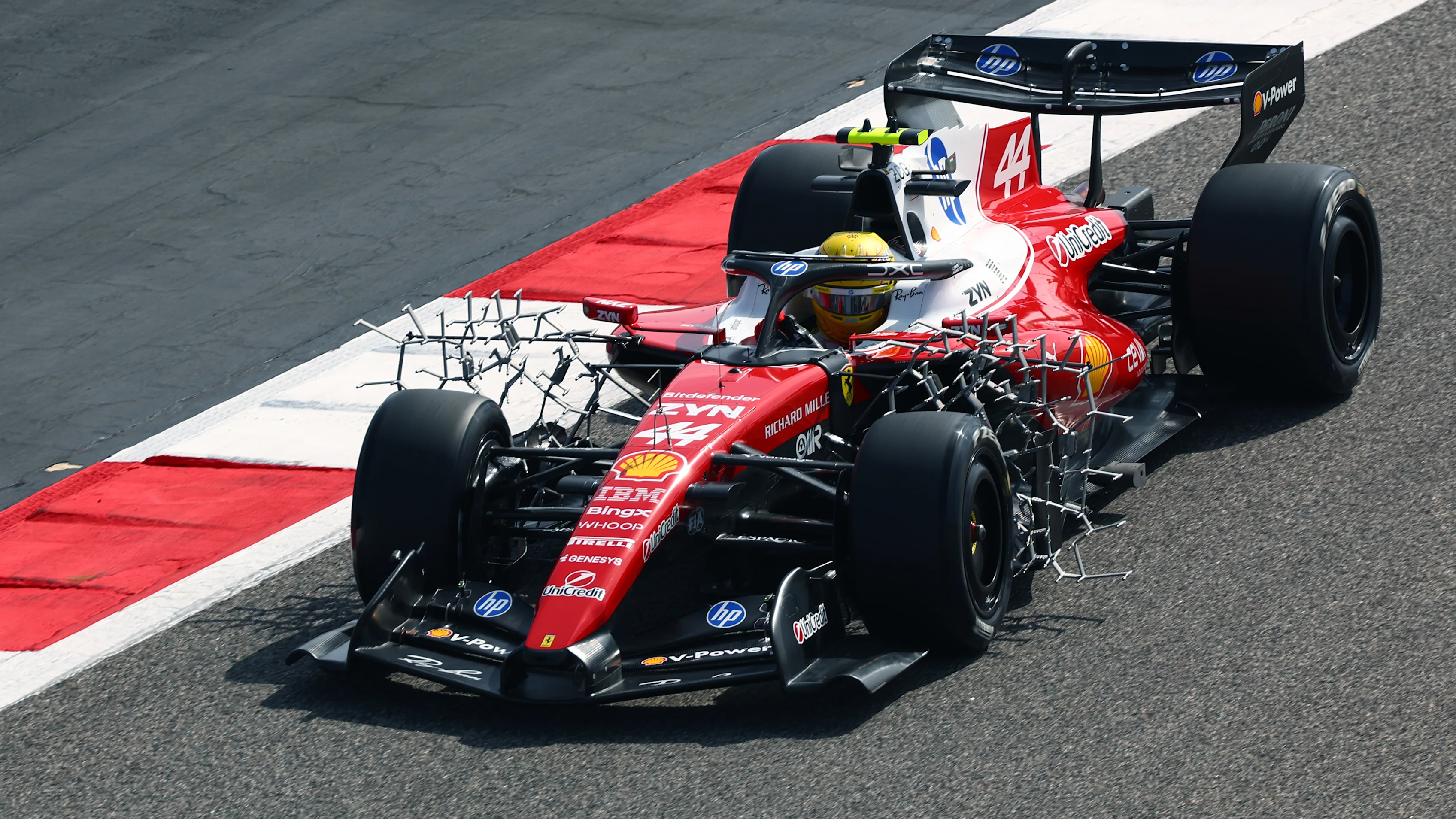 BAHRAIN, BAHRAIN - FEBRUARY 11: Lewis Hamilton of Great Britain driving the (44) Scuderia Ferrari