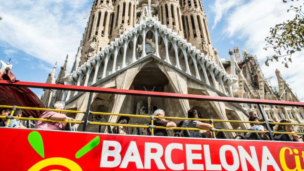 BARCELONA, CATALONIA, SPAIN - 2021/09/20: Barcelona City Tour bus seen in front of the Basilica of